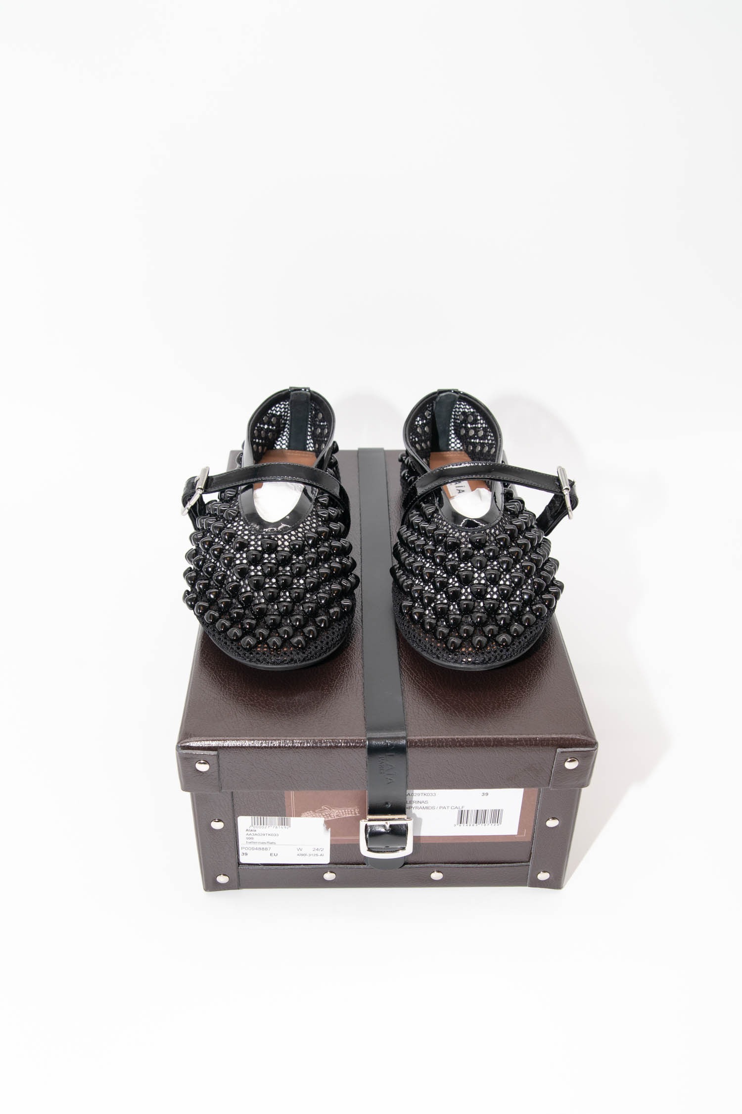 Alaïa Ballerinas mit Pyramidennieten in Schwarz