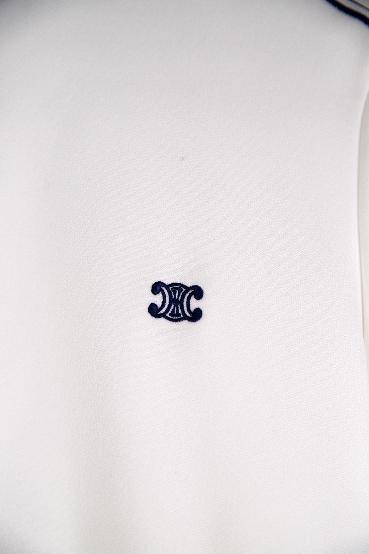 Celine Trainingsjacke in Weiß und Dunkelblau