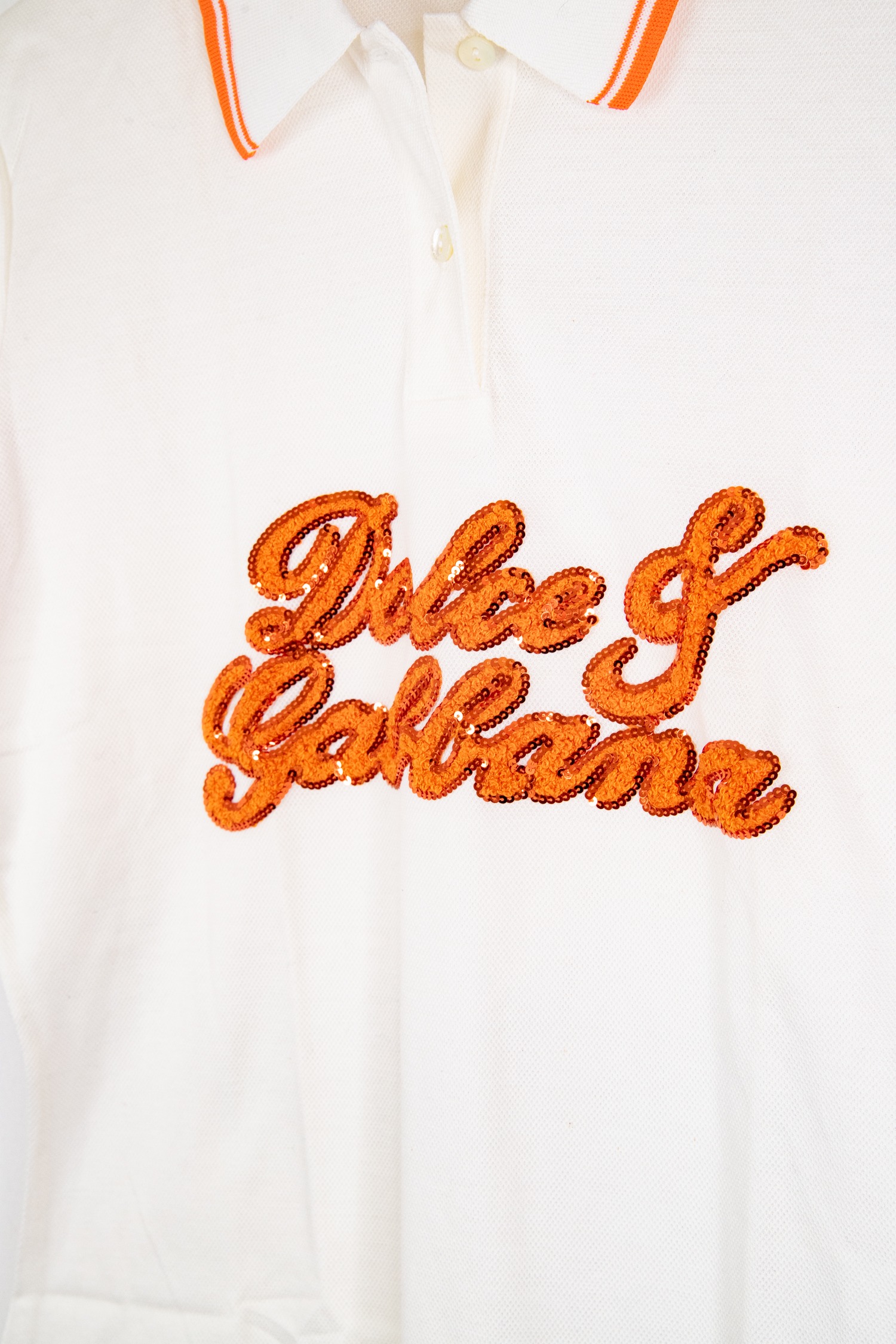Dolce & Gabbana Poloshirt mit Pailletten in Weiß und Orange