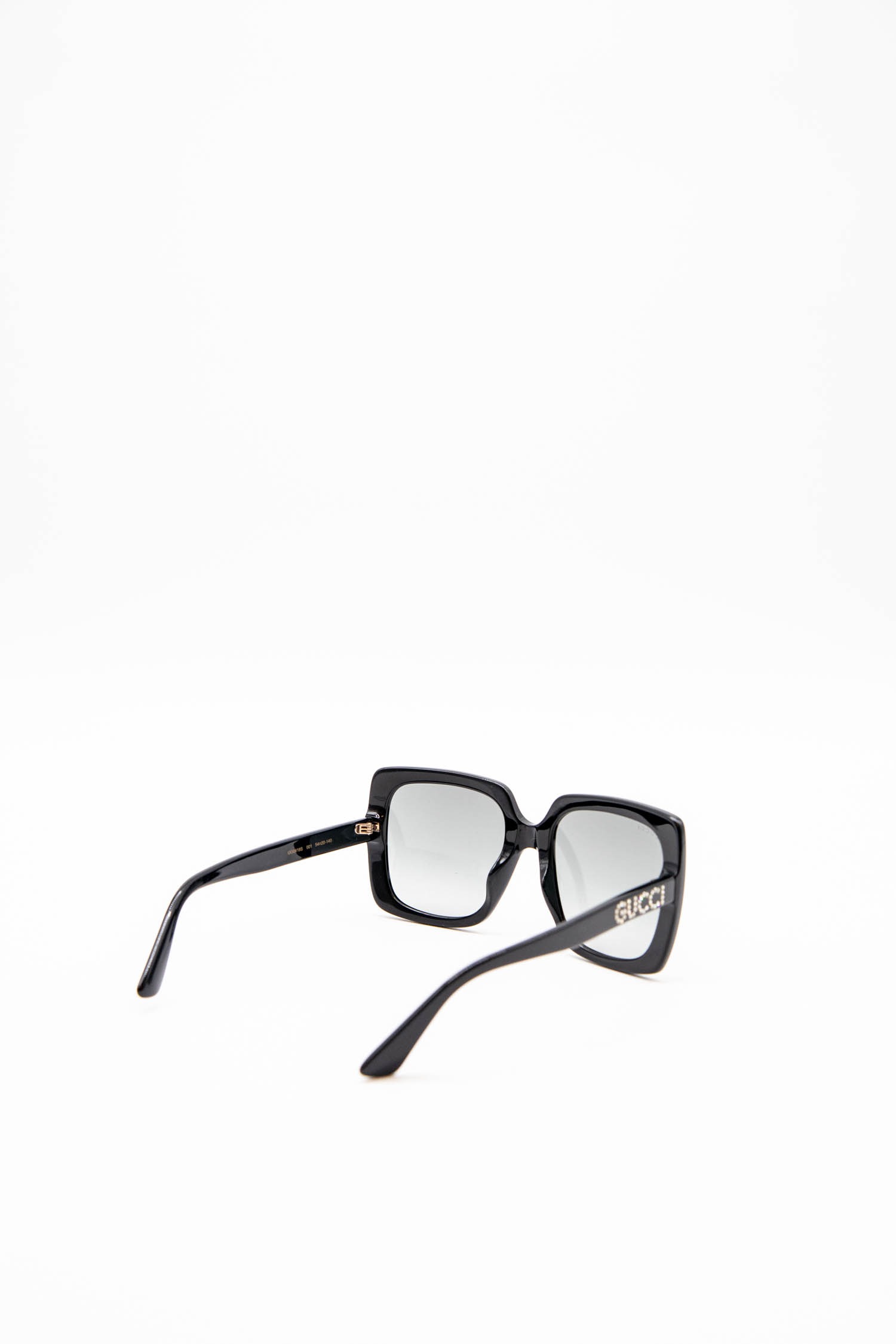 Gucci Sonnenbrille mit rechteckigem Rahmen in Schwarz