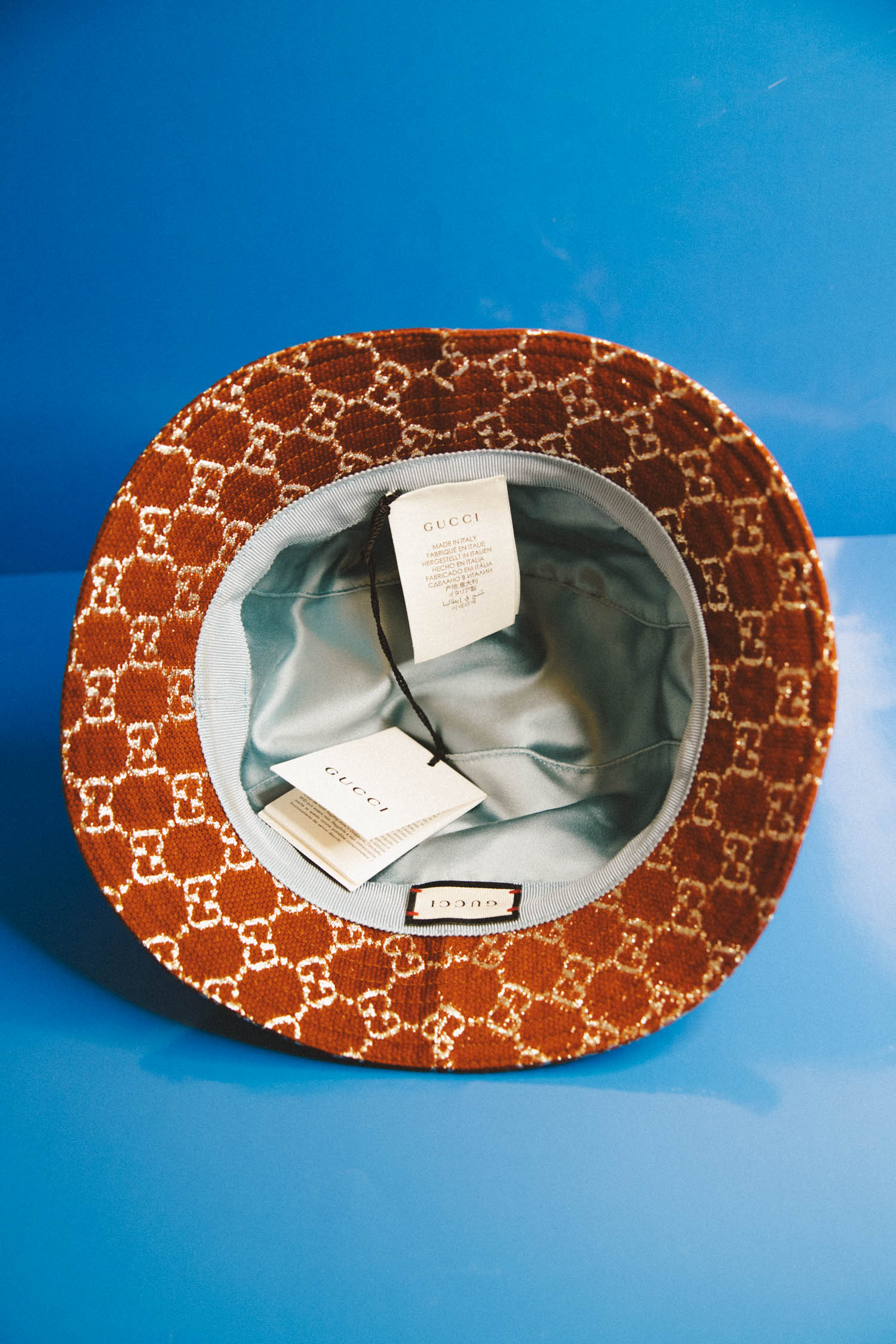 Gucci Bucket Hat in Cognac und Silber