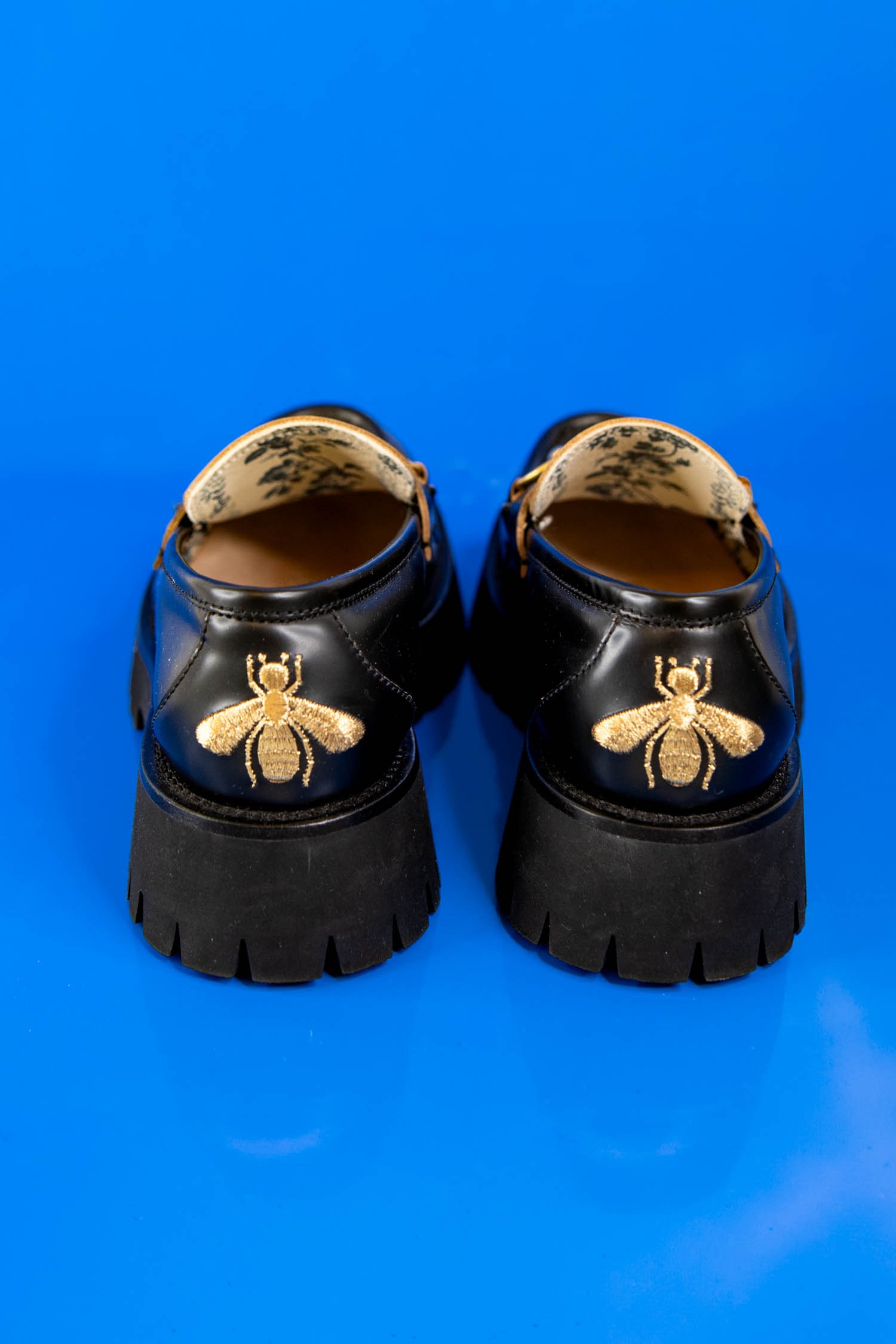 Gucci Loafer mit goldenen Details