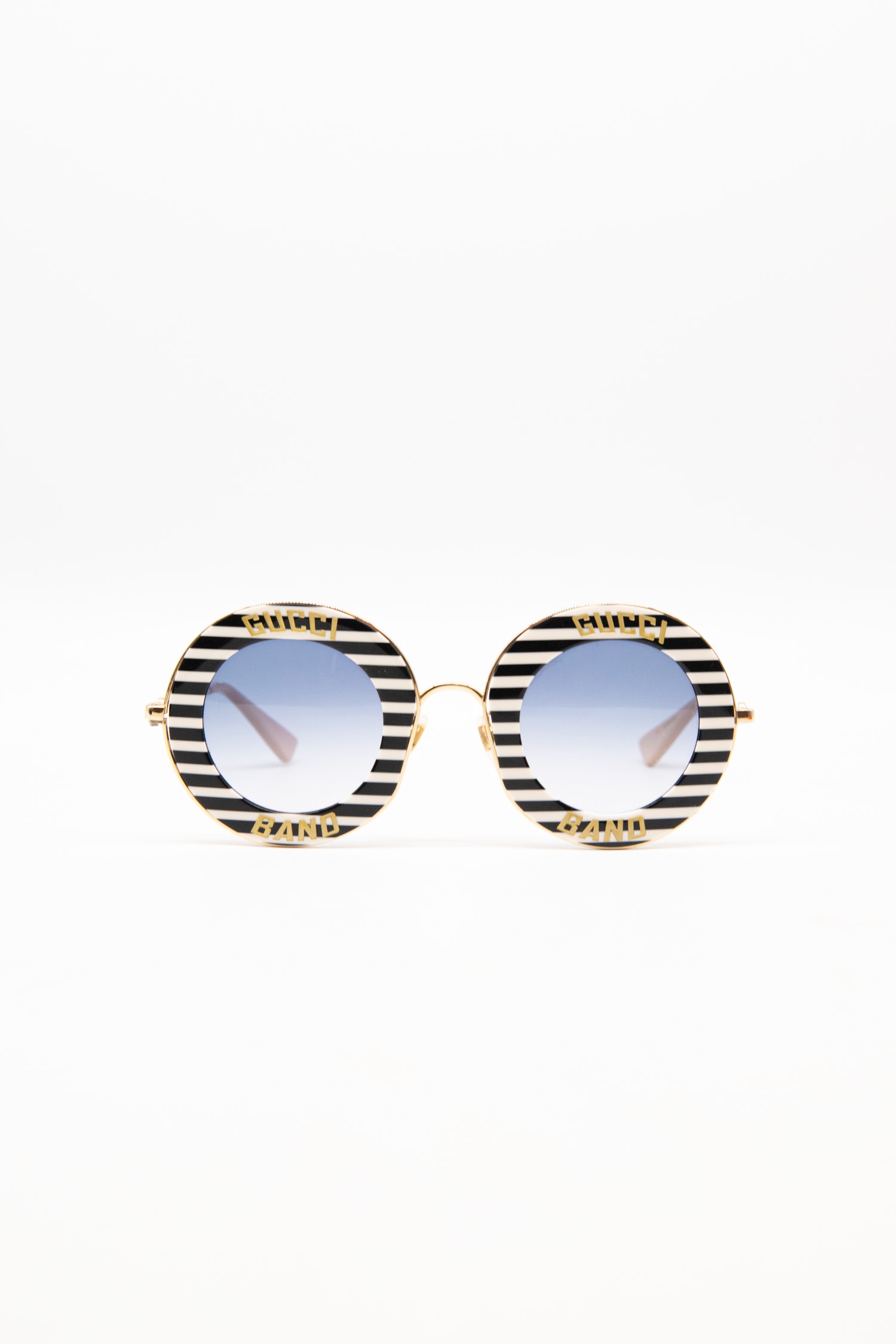 Gucci "Gucci Band" runde Sonnenbrille in Creme und Schwarz