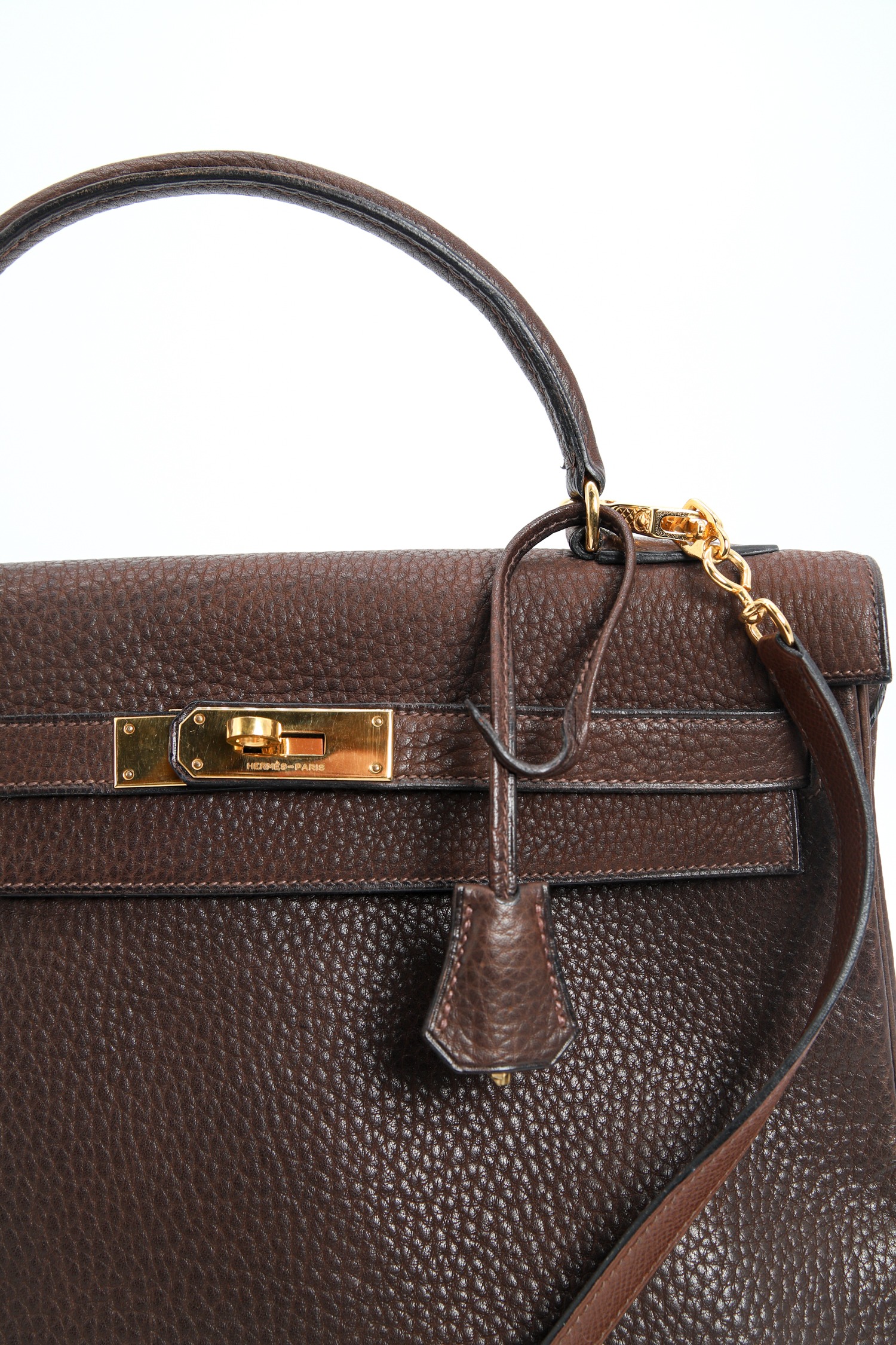 Hermès "Kelly Bag" in Dunkelbraun und Gold