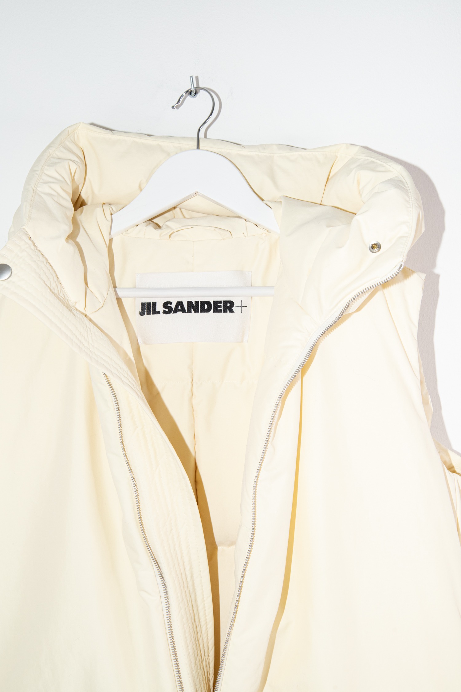 Jil Sander Oversized Daunenweste in Pastellgelb