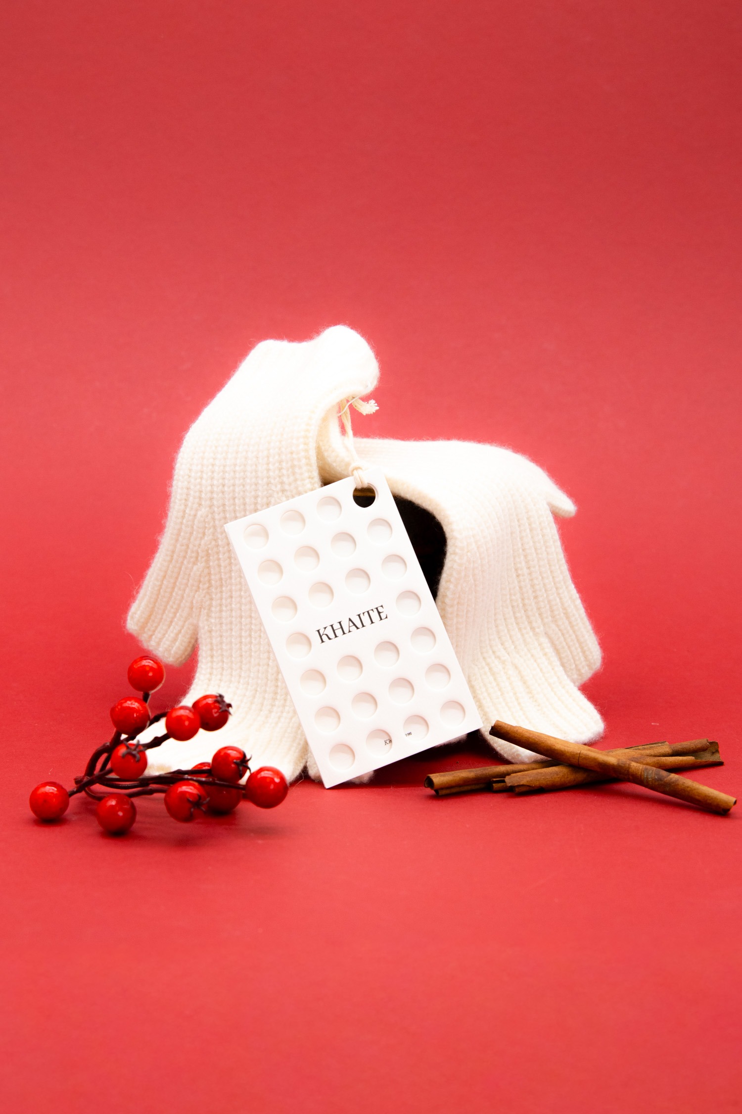 Khaite fingerlose Handschuhe in Cremeweiß