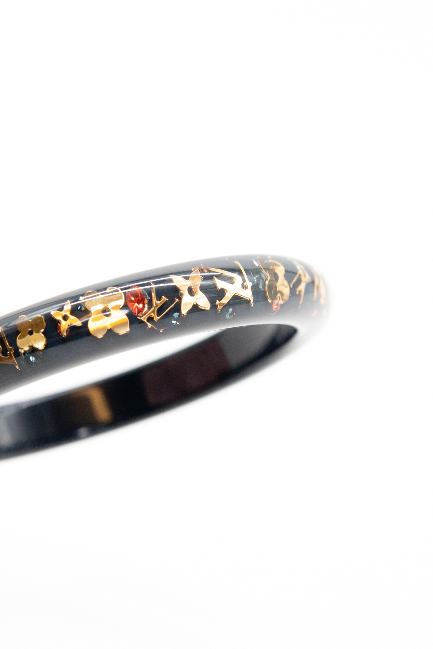 Louis Vuitton Armreif in Schwarz und Gold