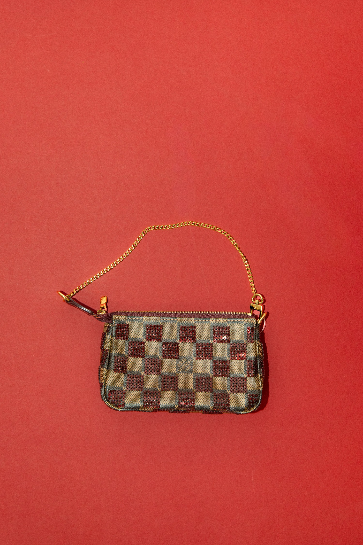 Louis Vuitton "Mini Pouchette" mit Pailletten in Braun und Gold