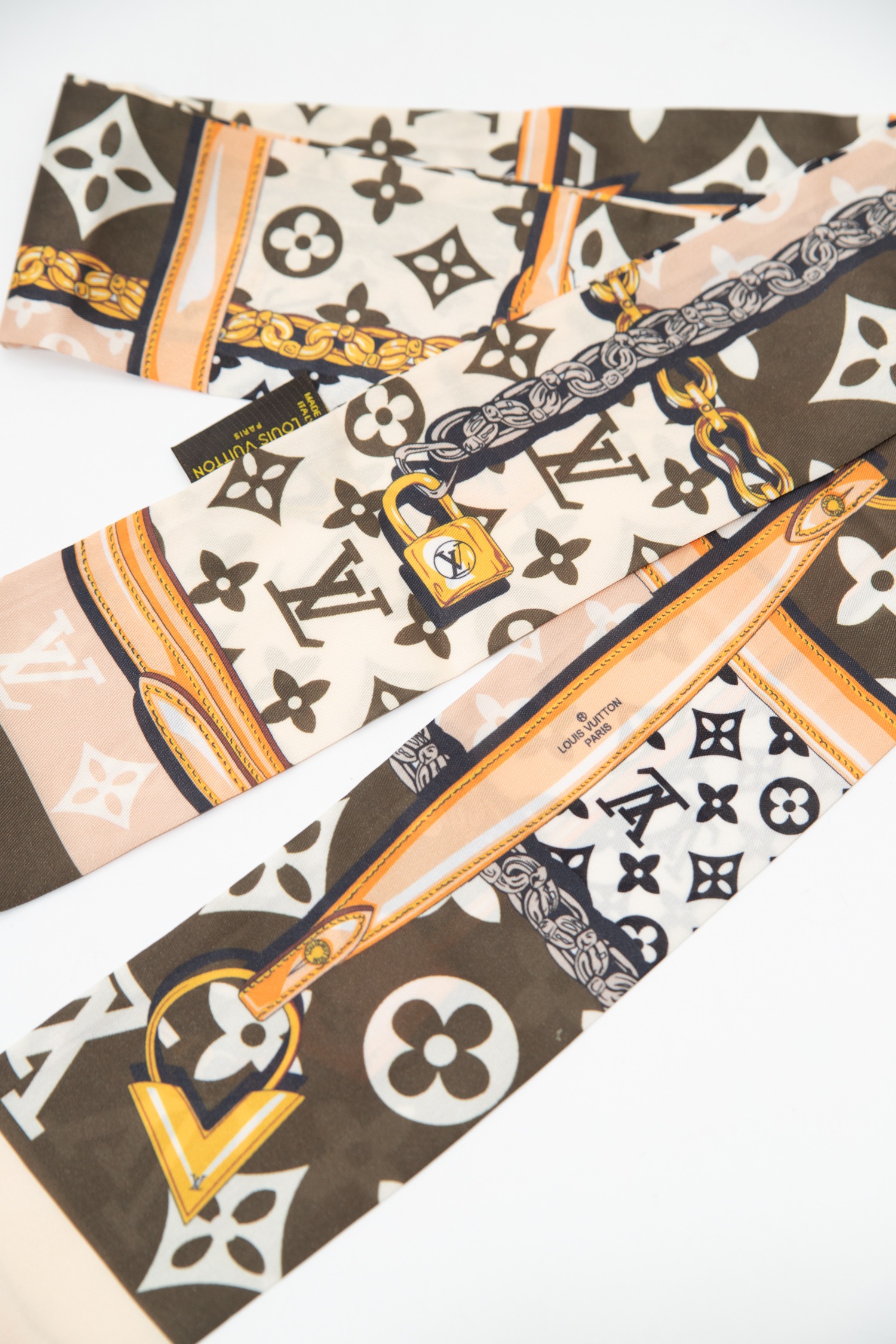 Louis Vuitton Twilly in Beige, Ecru, Gold und Braun
