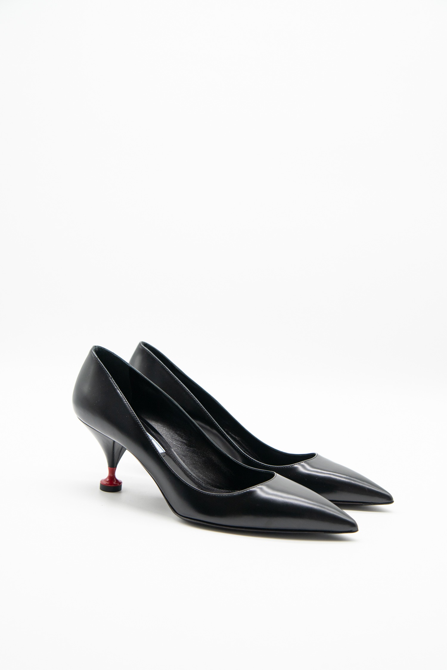 Prada "Eiffelturm" spitze Pumps in Schwarz
