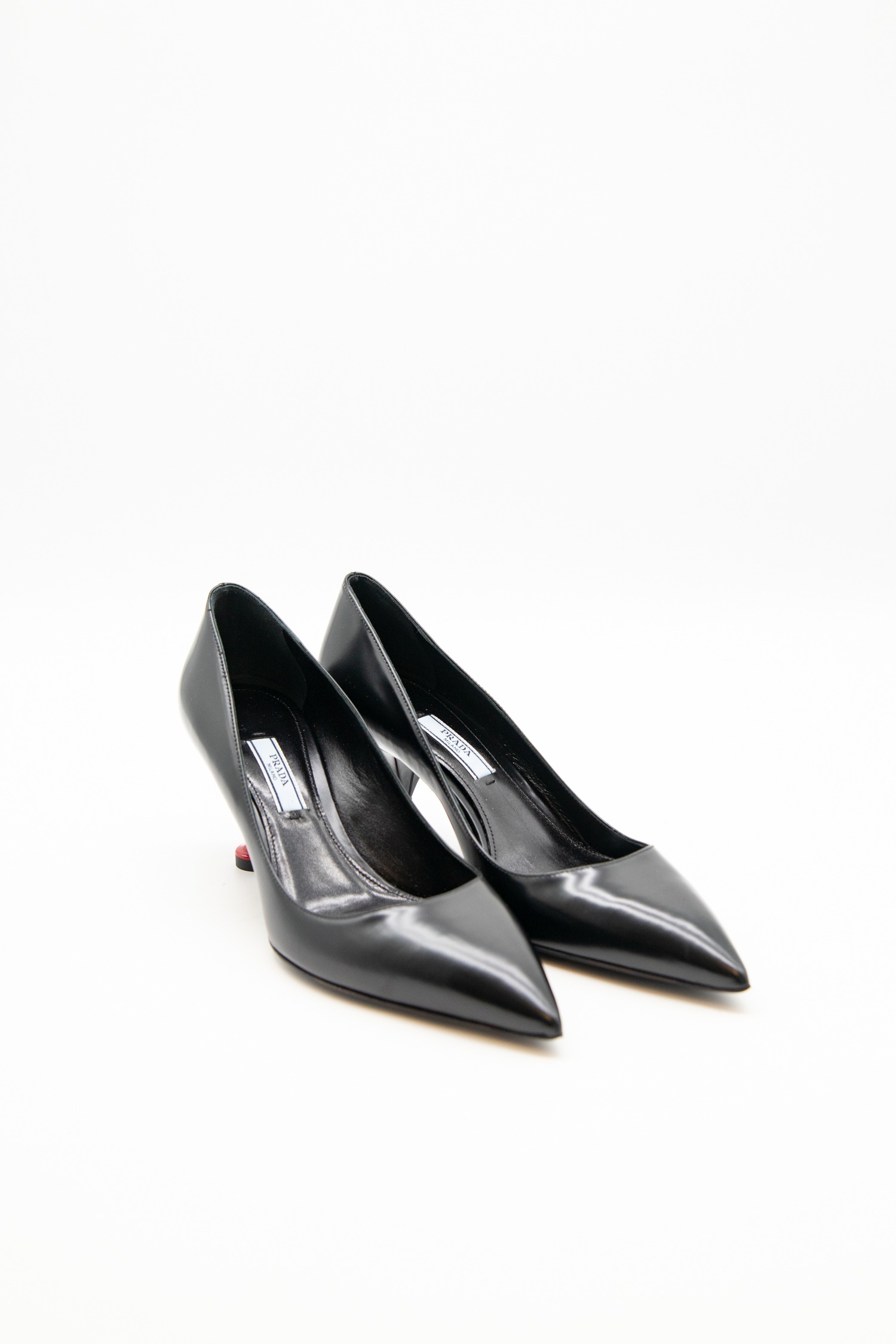 Prada "Eiffelturm" spitze Pumps in Schwarz
