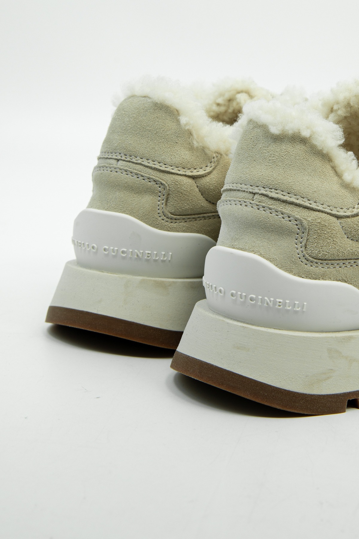 Brunello Cucinelli Sneaker mit Shearling in Hellbeige und Ecru
