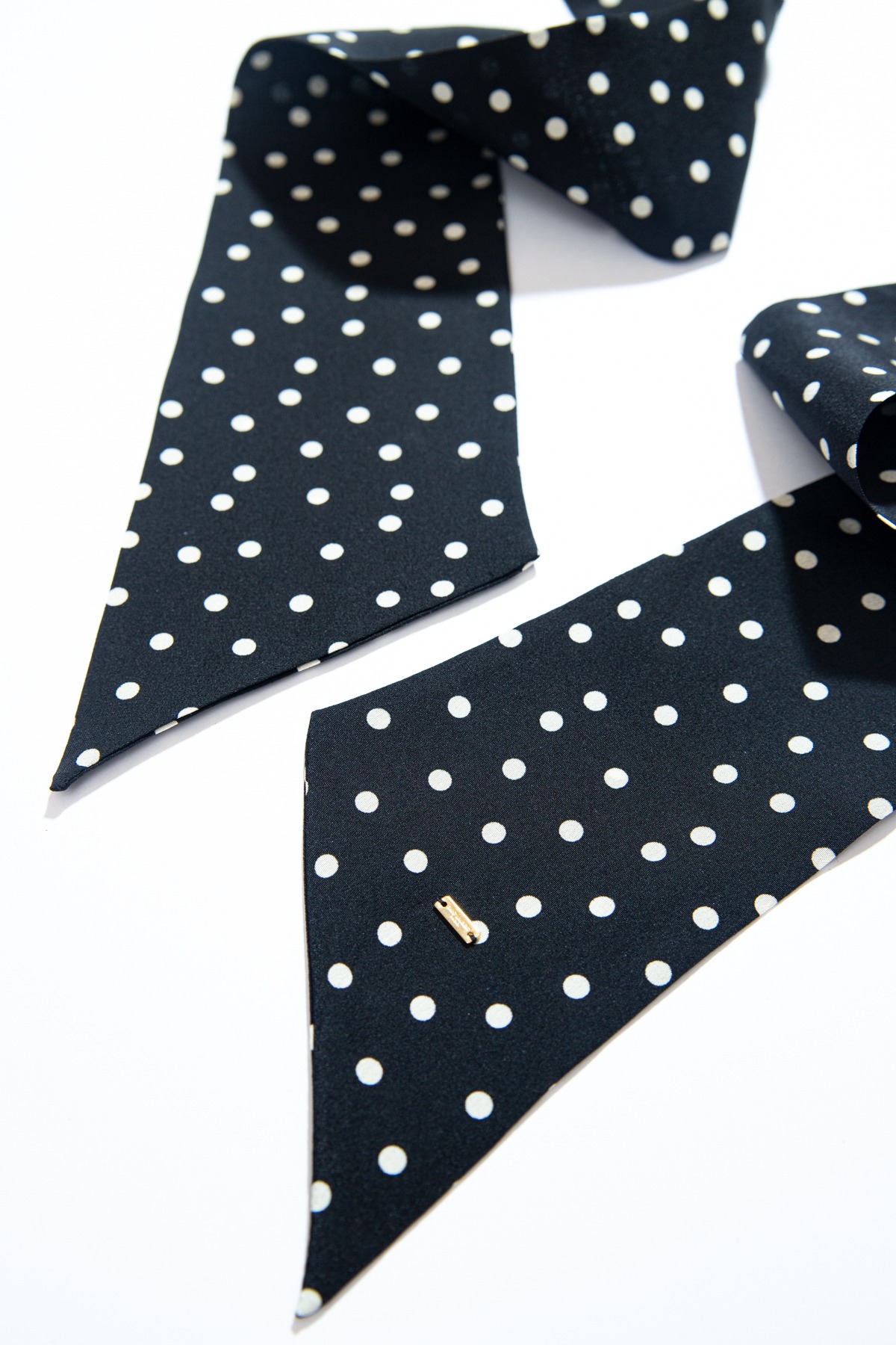 Saint Laurent Twilly mit Punkten in Schwarz und Ecru