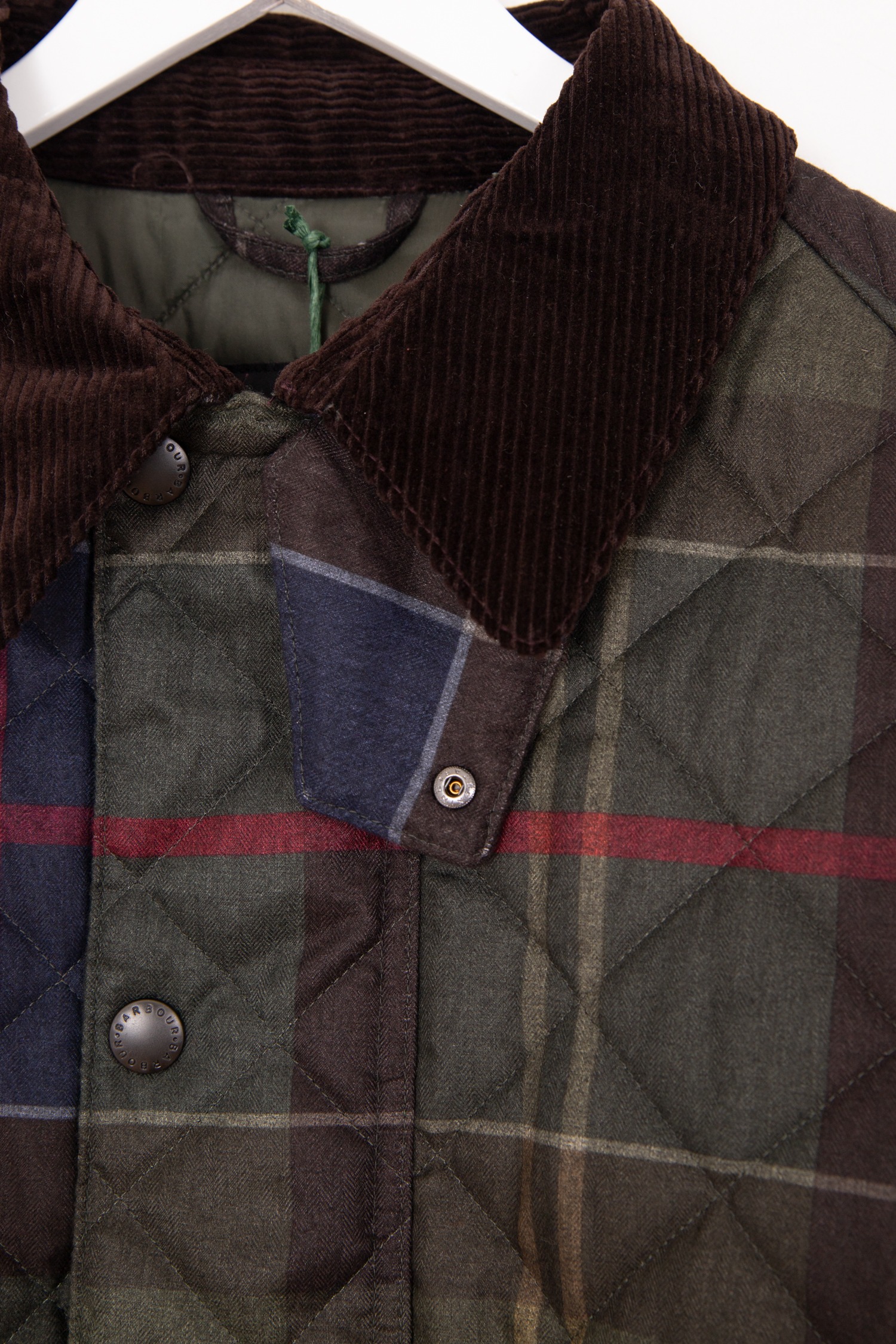 Barbour "Tartan Transport" Steppjacke in Dunkelgrün und Bunt