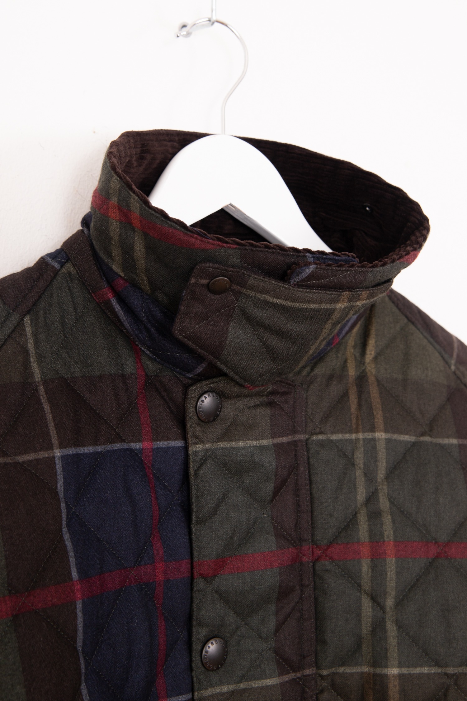 Barbour "Tartan Transport" Steppjacke in Dunkelgrün und Bunt