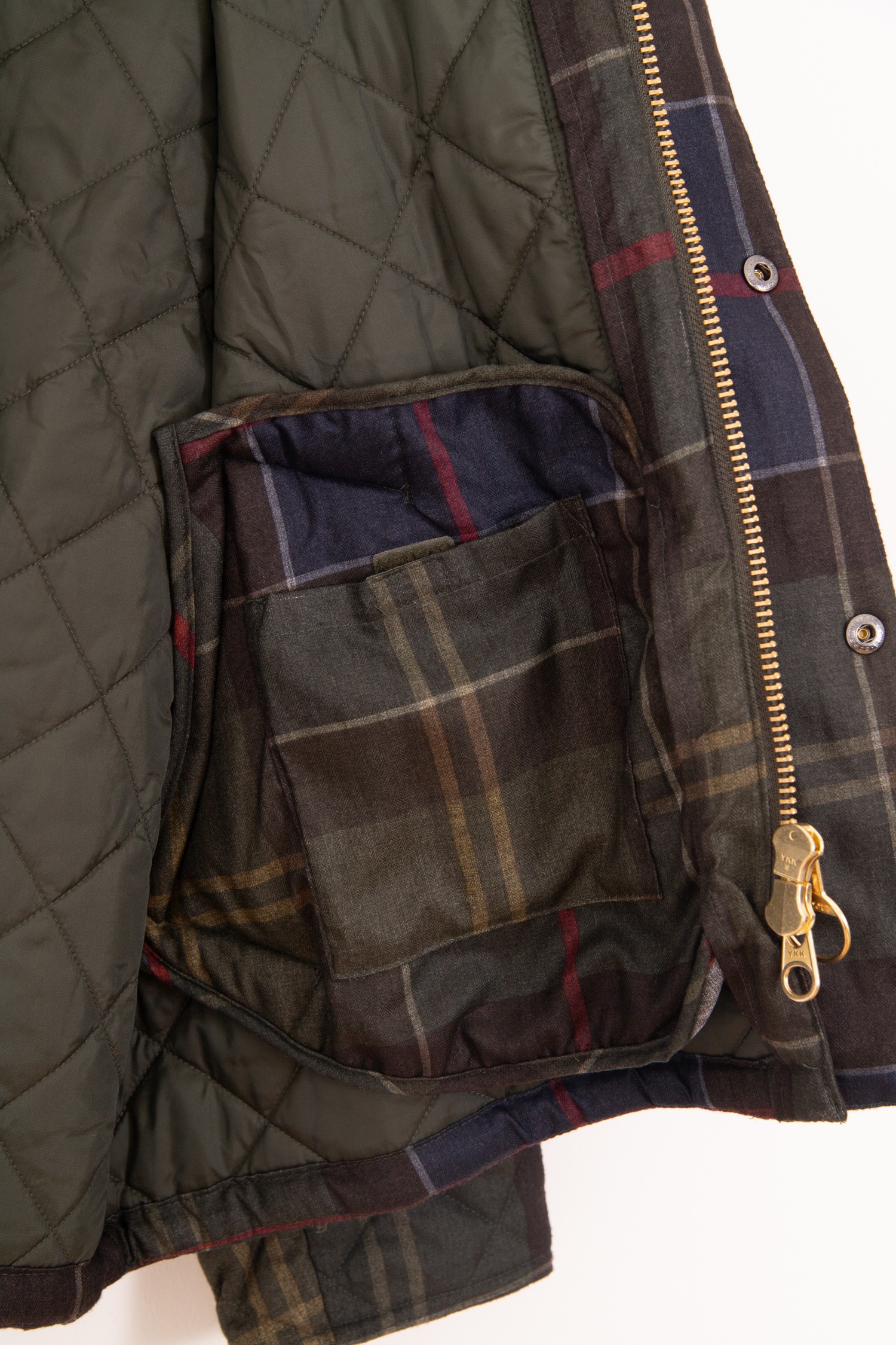 Barbour "Tartan Transport" Steppjacke in Dunkelgrün und Bunt
