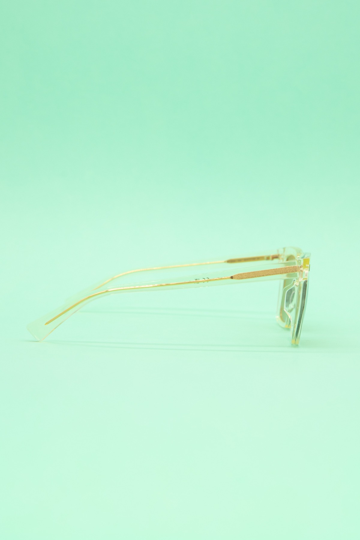 Bottega Veneta Sonnenbrille in Transparent und Gold