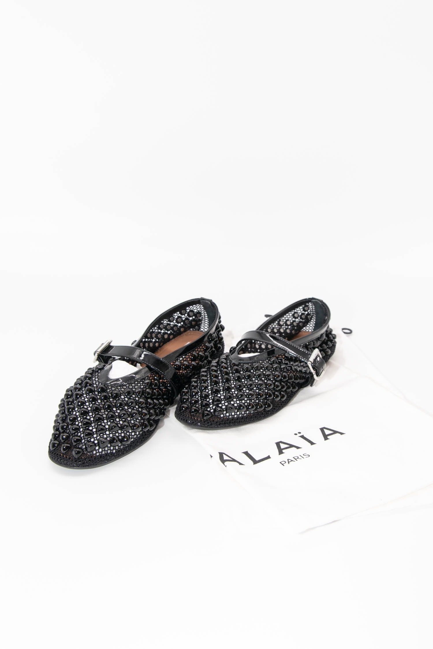 Thumbnail of http://Alaïa%20Ballerinas%20mit%20Pyramidennieten%20in%20Schwarz
