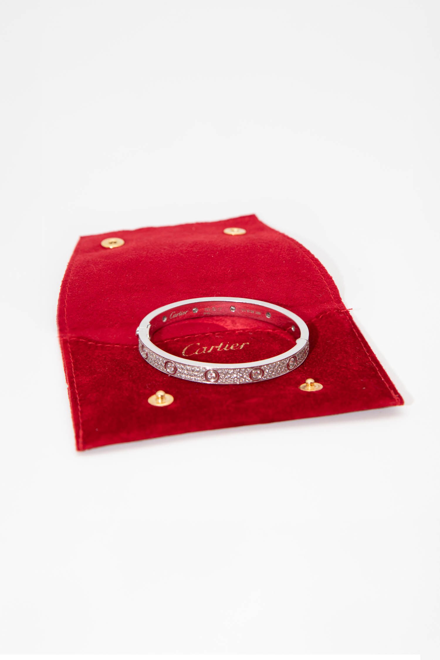 Cartier "Love" Armreif mit Diamanten