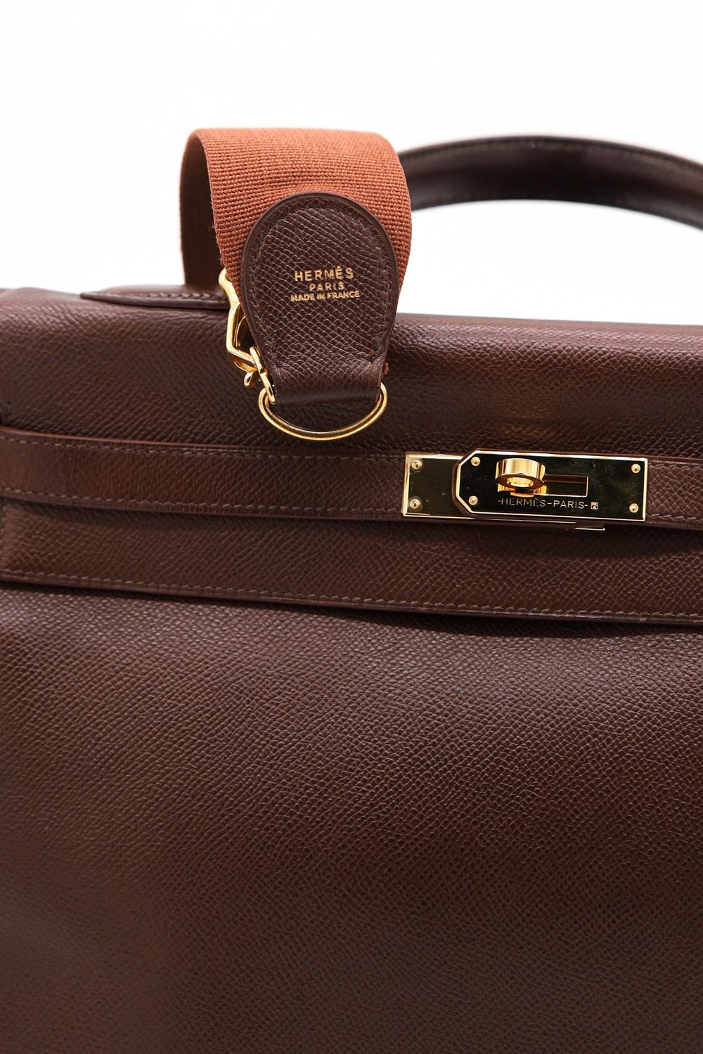 Thumbnail of http://Hermès%20Kelly%20Vintage%20Handtasche%20in%20Braun%20und%20Gold