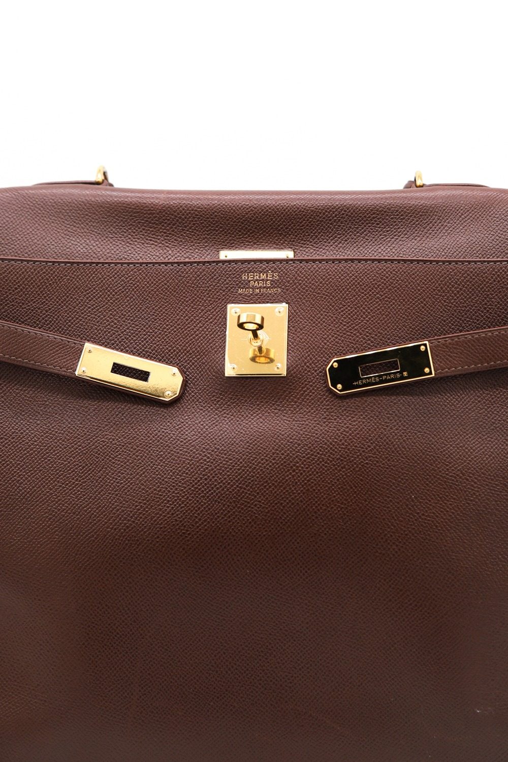 Thumbnail of http://Hermès%20Kelly%20Vintage%20Handtasche%20in%20Braun%20und%20Gold