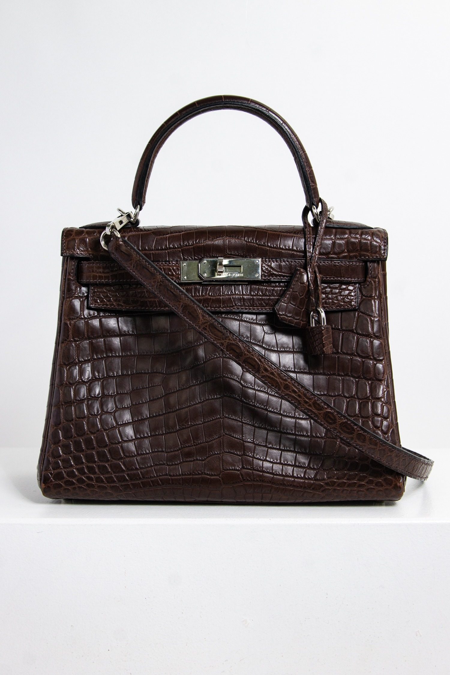 Thumbnail of http://Hermès%20Kelly%2028%20Niloticus%20in%20dunkelbraun