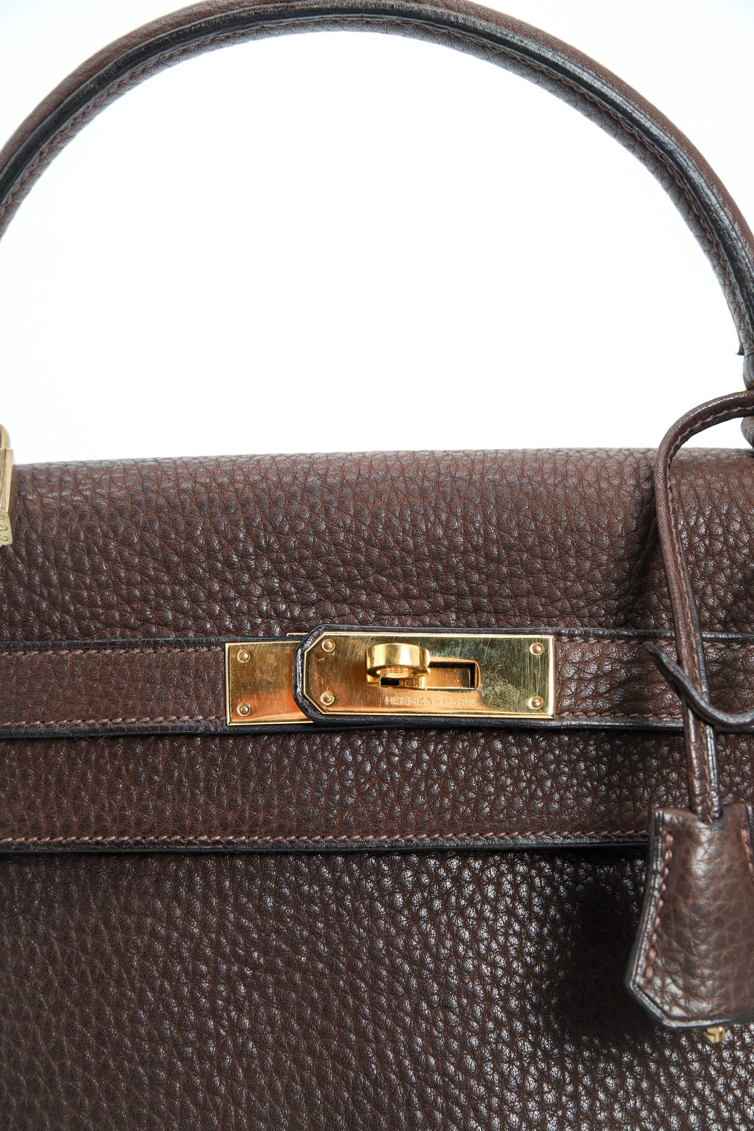 Hermès "Kelly Bag" in Dunkelbraun und Gold