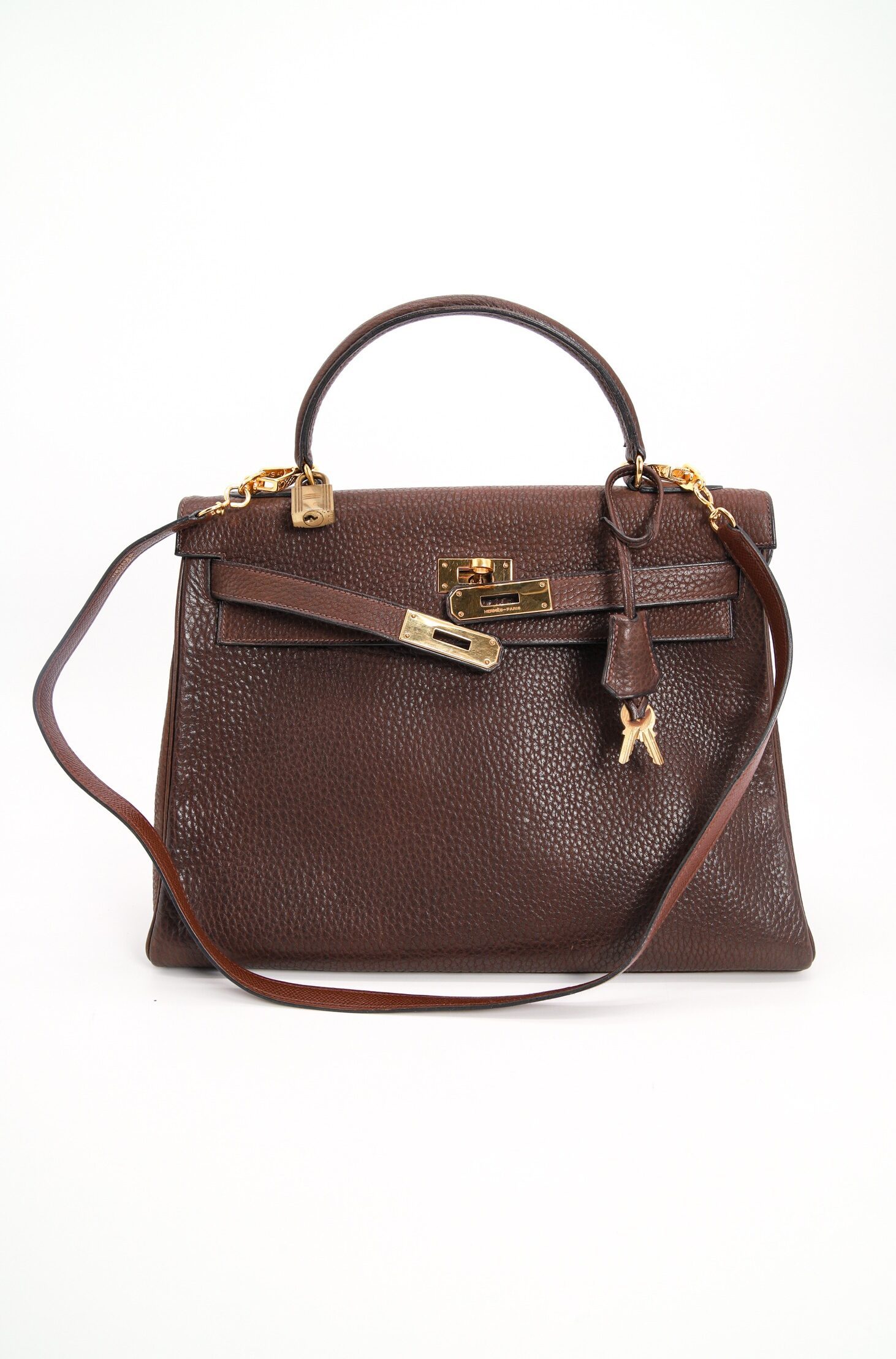 Thumbnail of http://Hermès%20Kelly%20Bag%20in%20Dunkelbraun%20und%20Gold