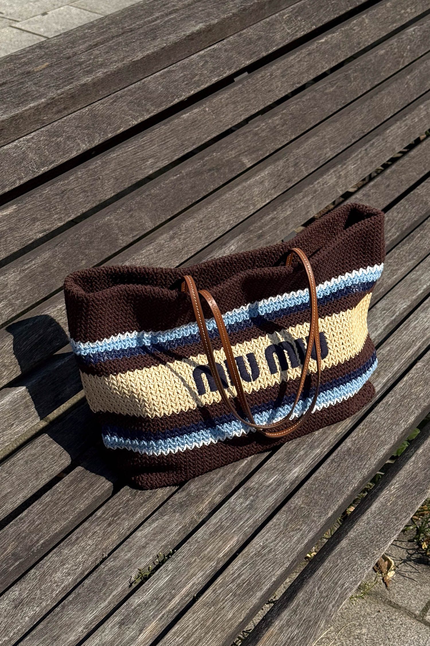 Thumbnail of http://Miu%20Miu%20Raffia-effect%20woven%20tote%20bag