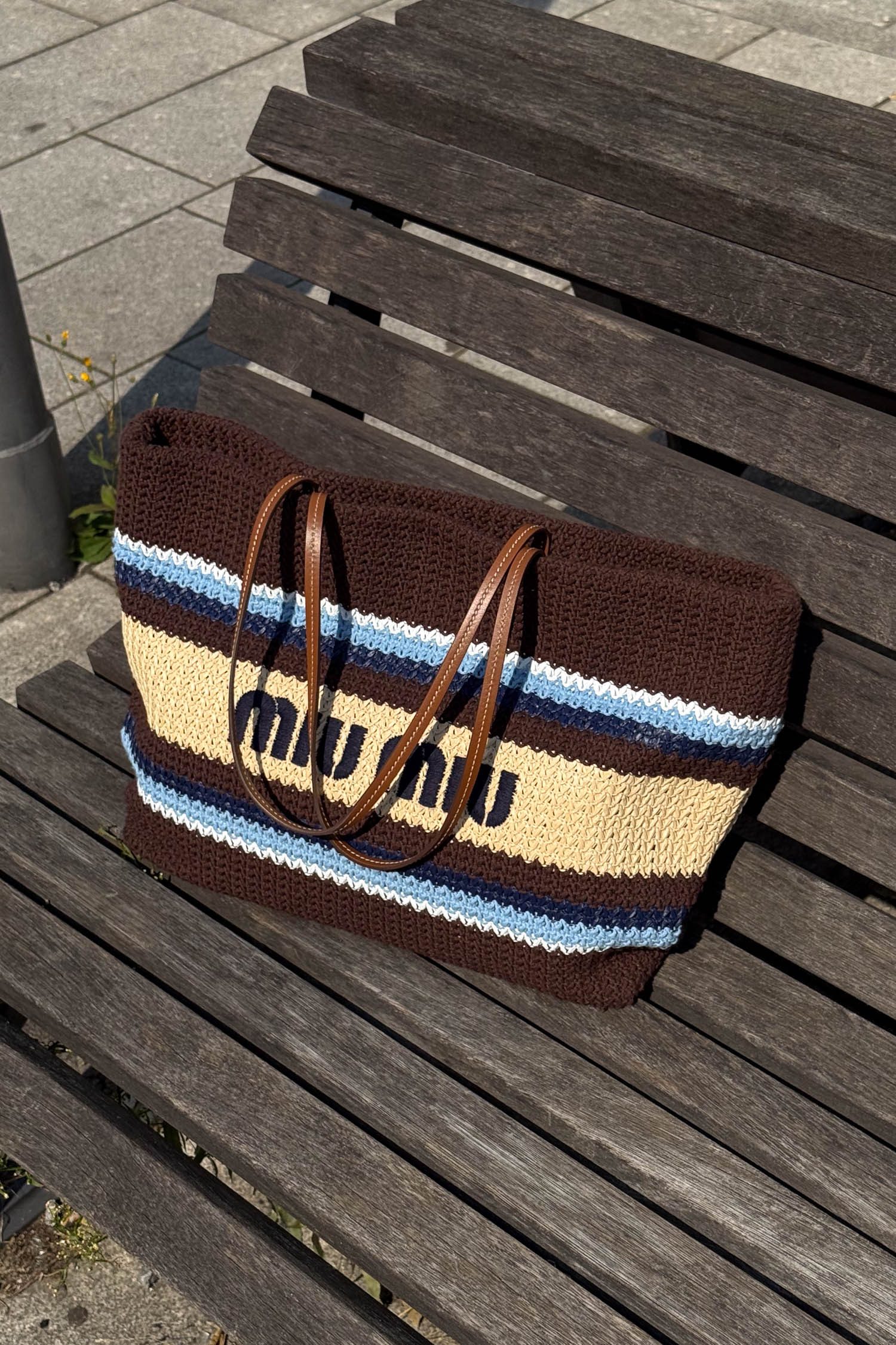 Thumbnail of http://Miu%20Miu%20Raffia-effect%20woven%20tote%20bag