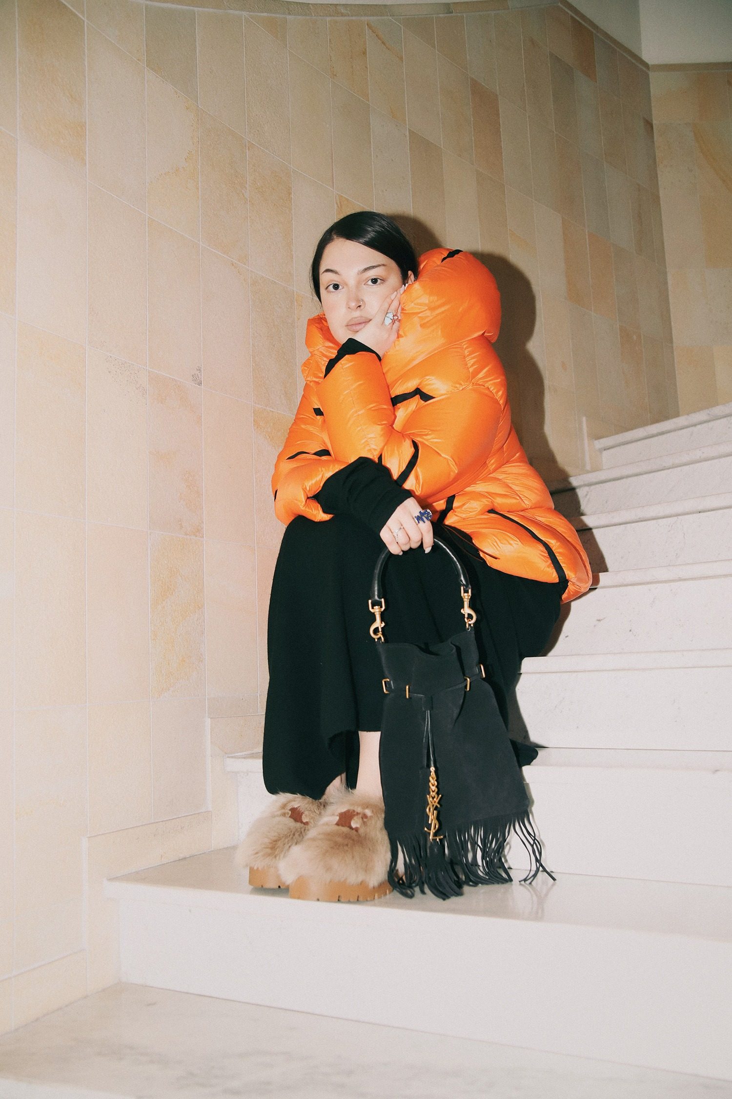 Thumbnail of http://Dorothee%20Schumacher%20Daunenjacke%20in%20Orange%20und%20schwarz