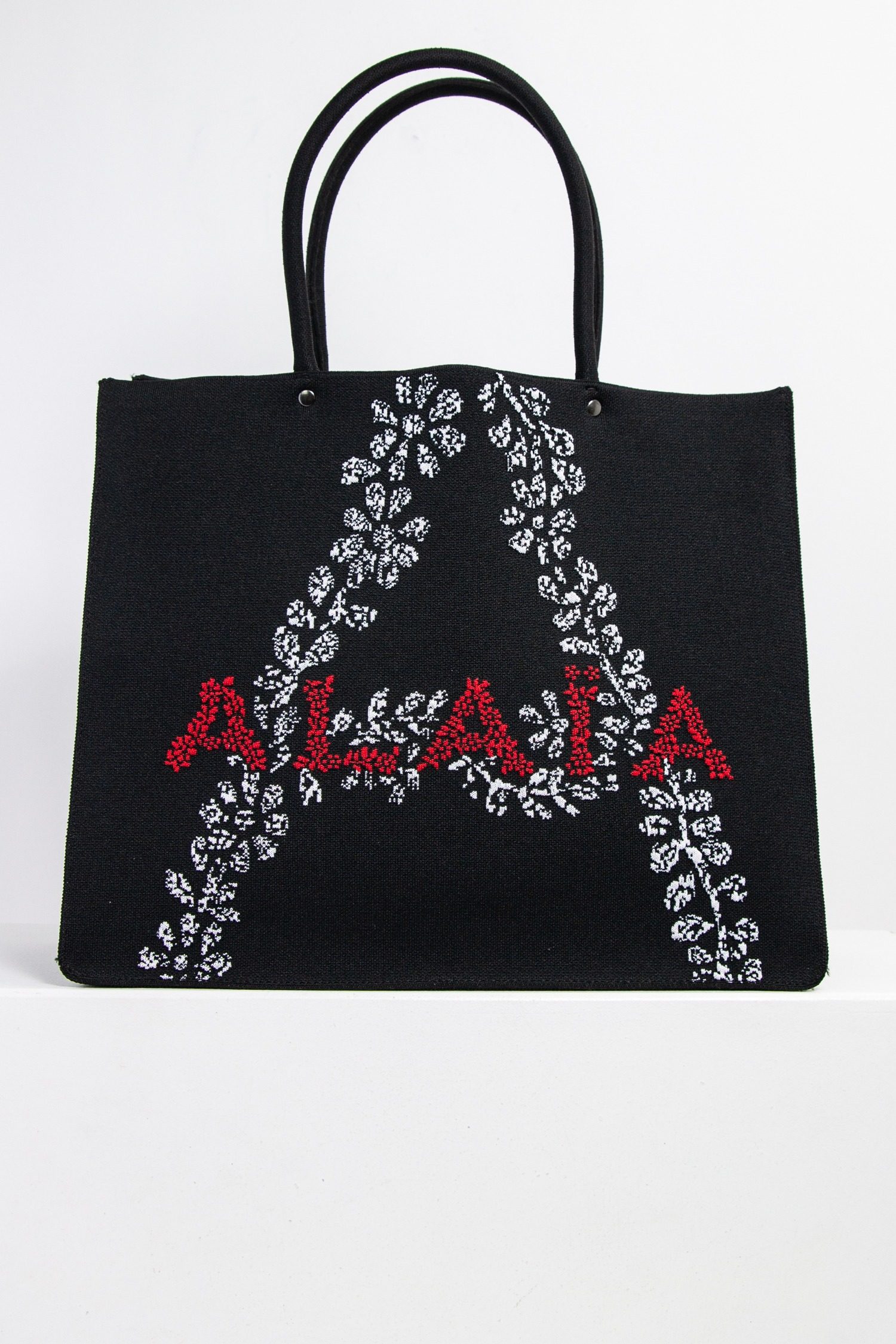 Thumbnail of http://Alaia%20Shopper%20mit%20Blumen-Logo%20aus%20Jacquard-Strick