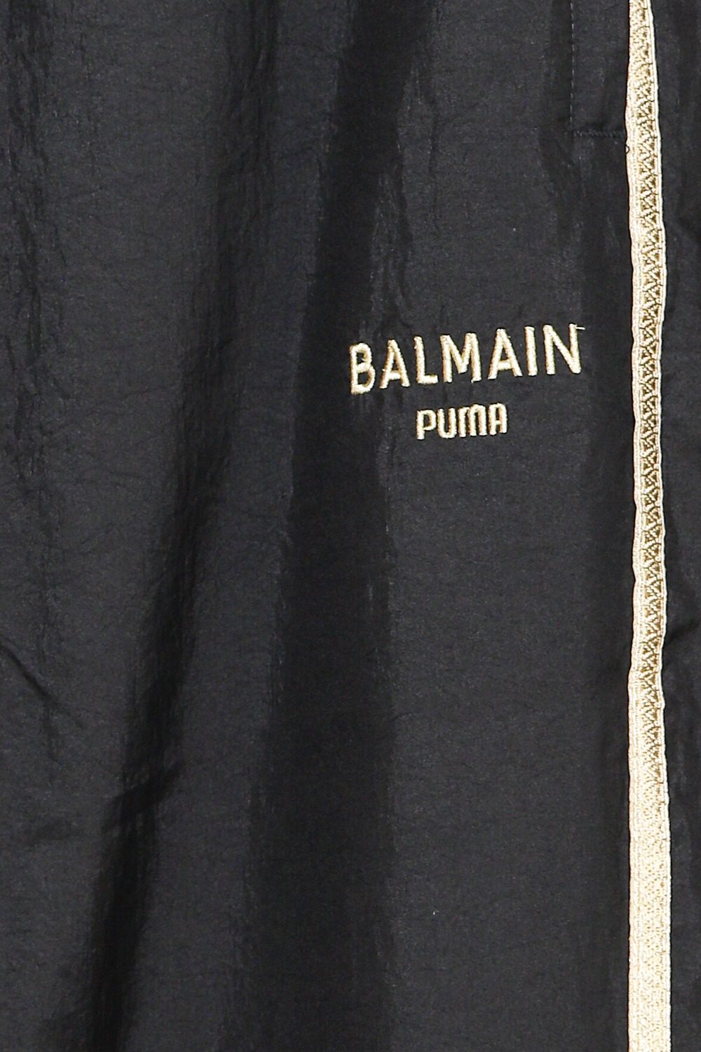 Thumbnail of http://Balmain%20x%20Puma%20Jogginghose%20in%20Schwarz%20und%20Gold