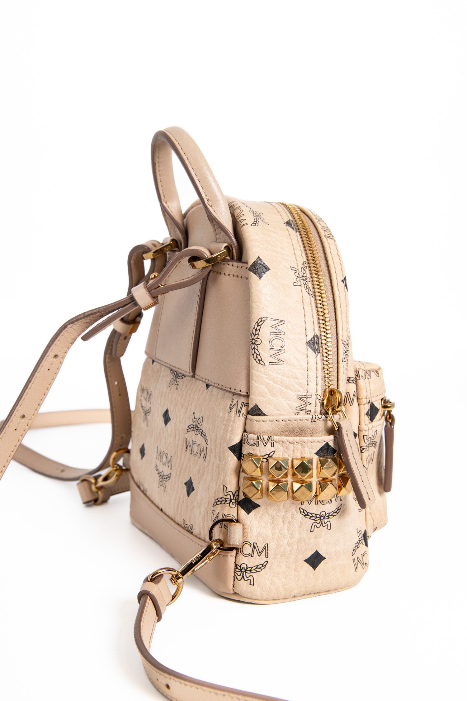 MCM kleiner Rucksack mit Monogramm in Beige