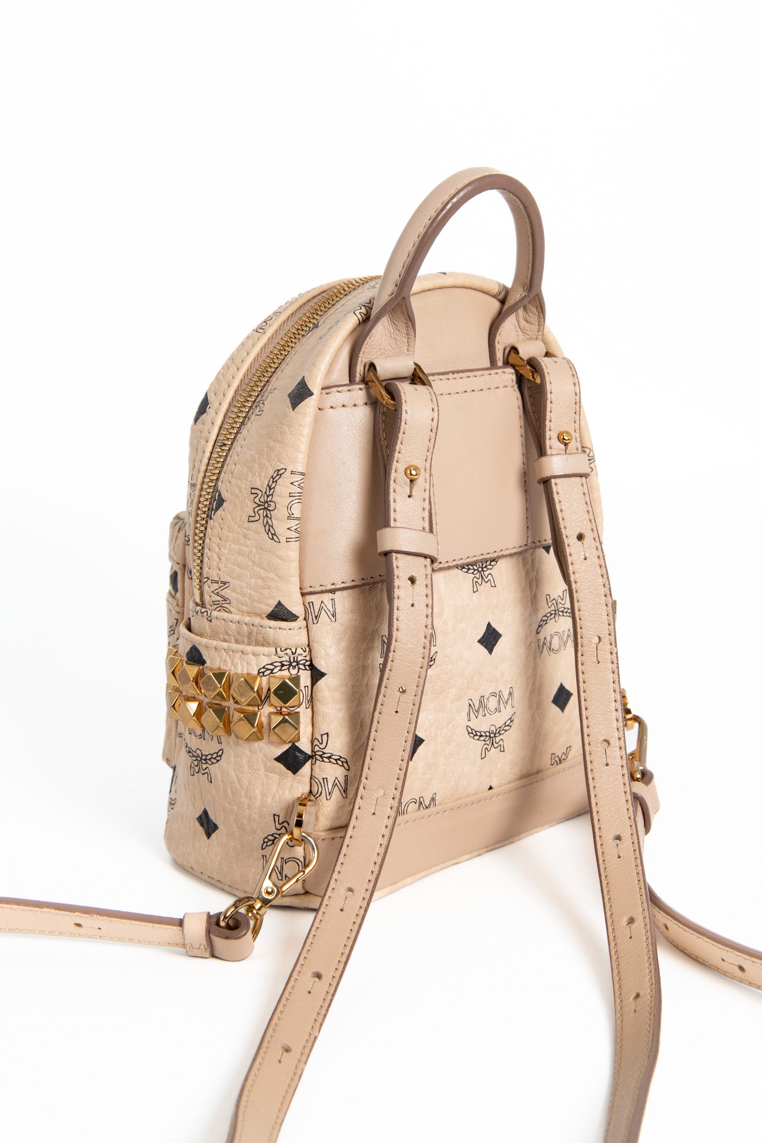MCM kleiner Rucksack mit Monogramm in Beige