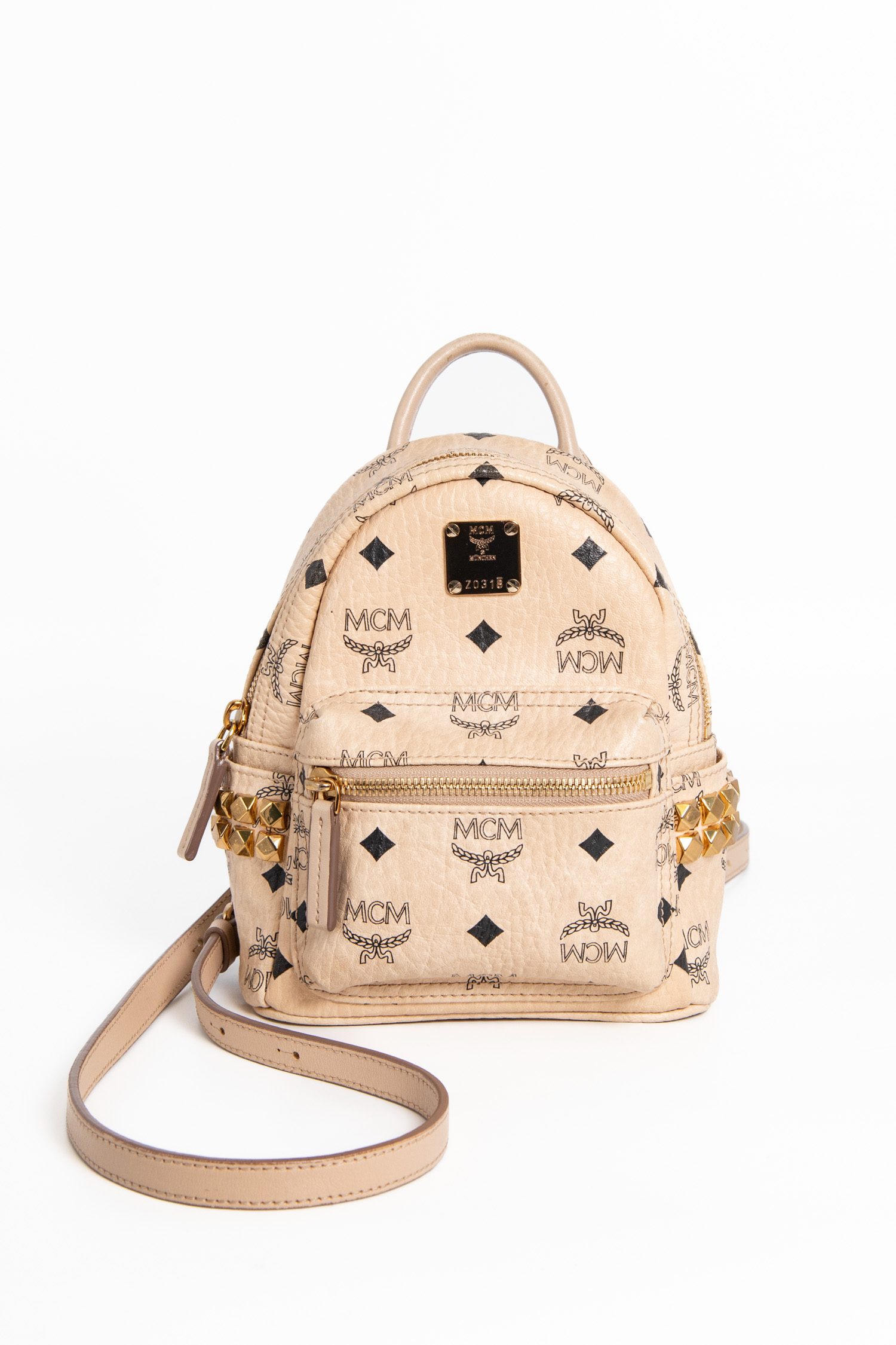 MCM kleiner Rucksack mit Monogramm in Beige