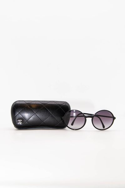 Chanel runde Sonnenbrille in Schwarz