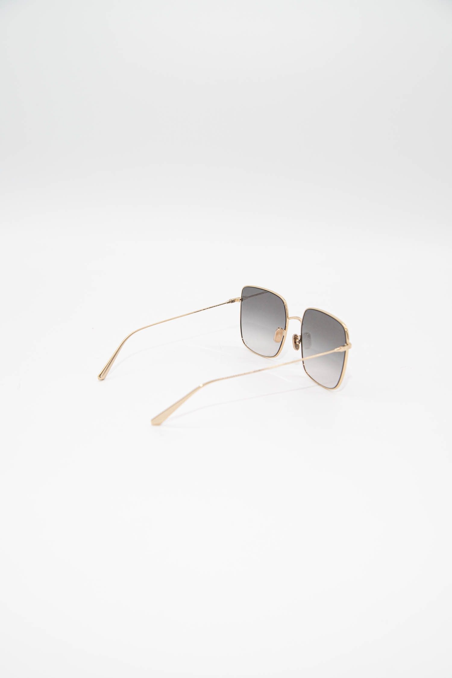 Thumbnail of http://Dior%20eckige%20Sonnenbrille%20mit%20schmalem%20Rahmen%20in%20Gold