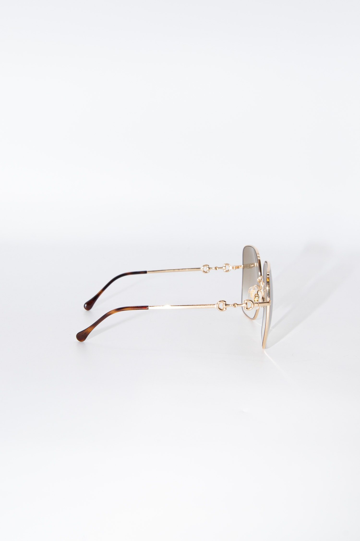 Thumbnail of http://Gucci%20Sonnenbrille%20mit%20eckigem%20Rahmen%20in%20Gold
