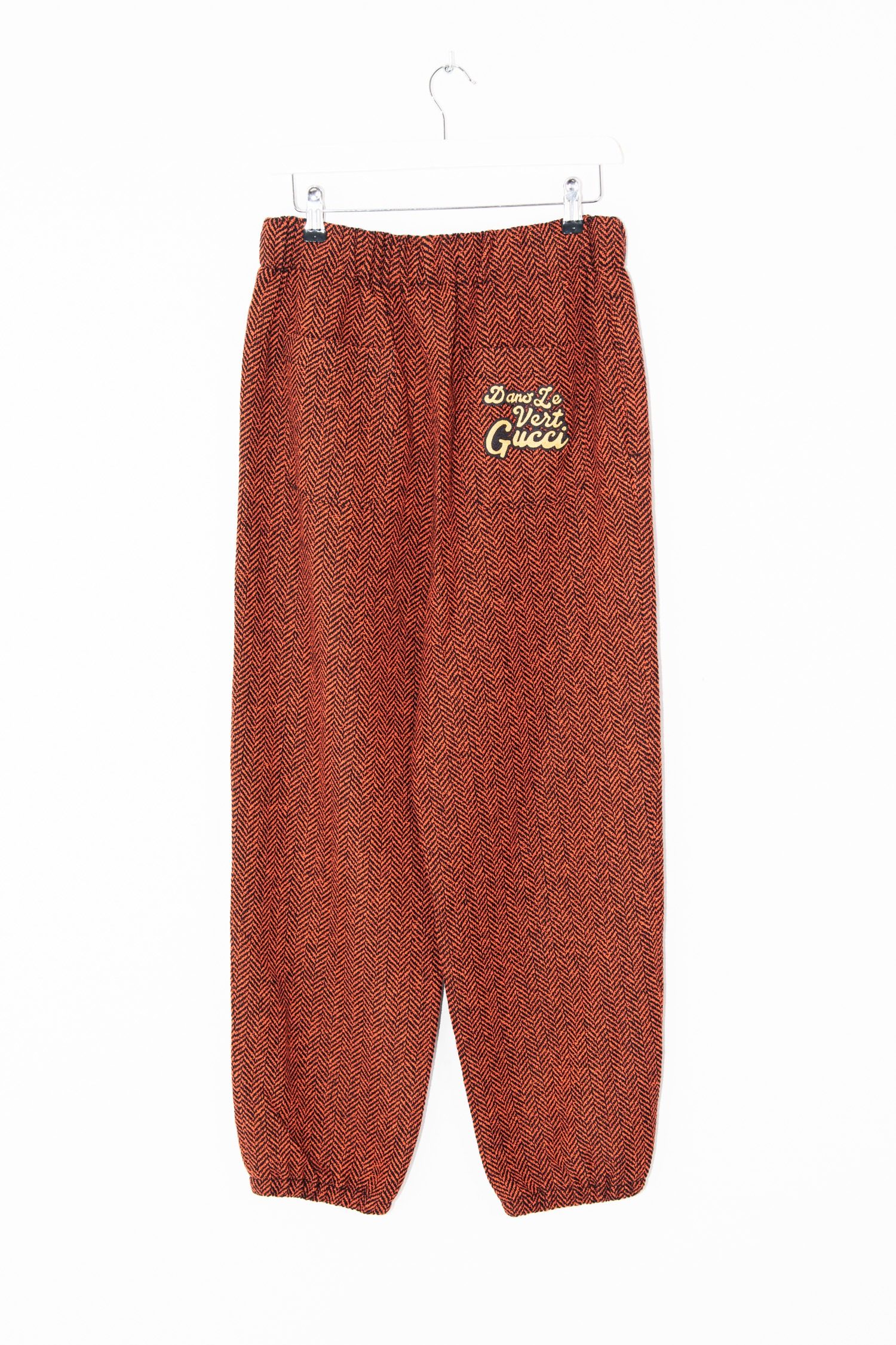 Thumbnail of http://Gucci%20Hose%20mit%20Fischgrätenmuster%20in%20Rot%20und%20Schwarz