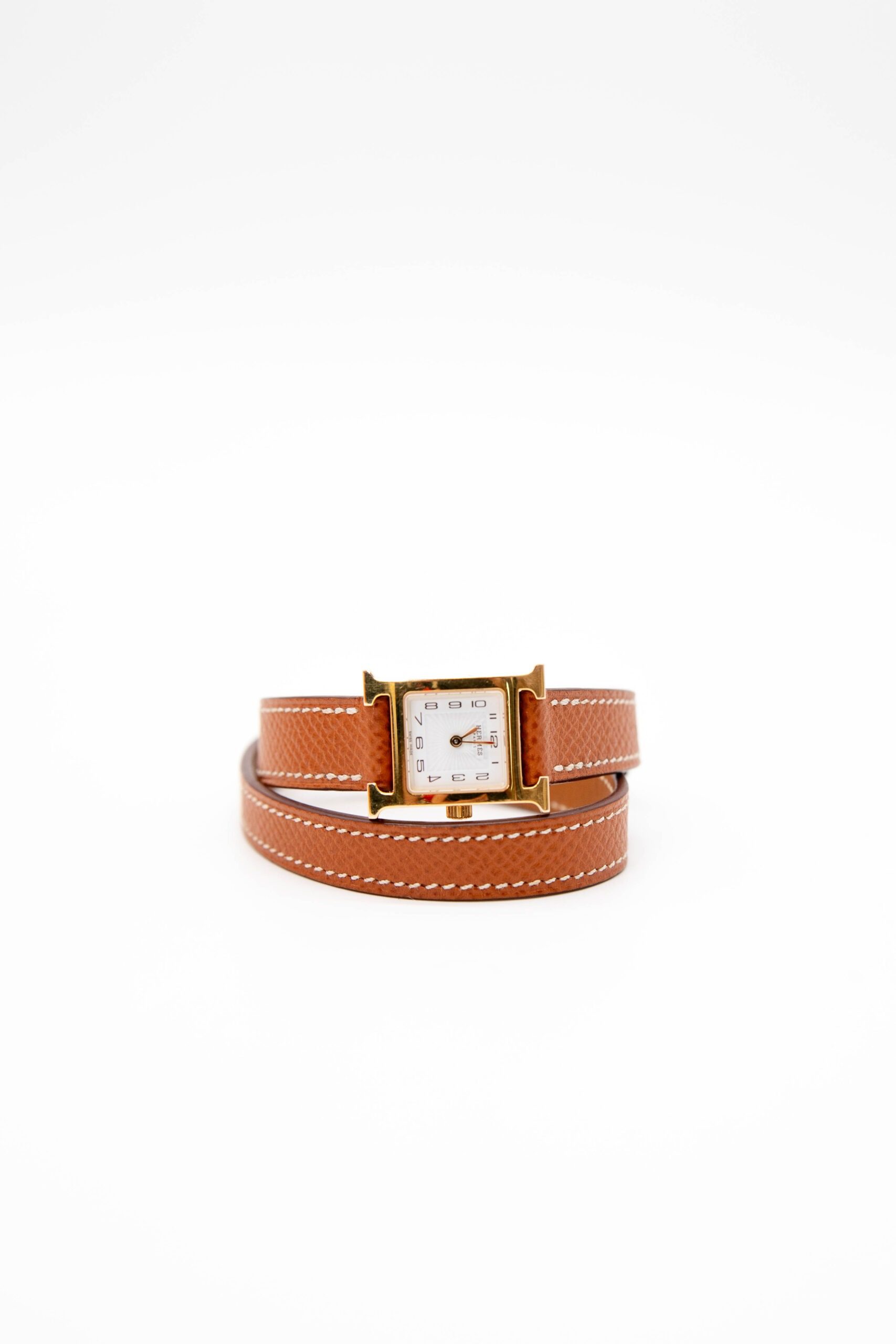 Thumbnail of http://Hermès%20Heure%20H%20Armbanduhr%20in%20Cognacfarben
