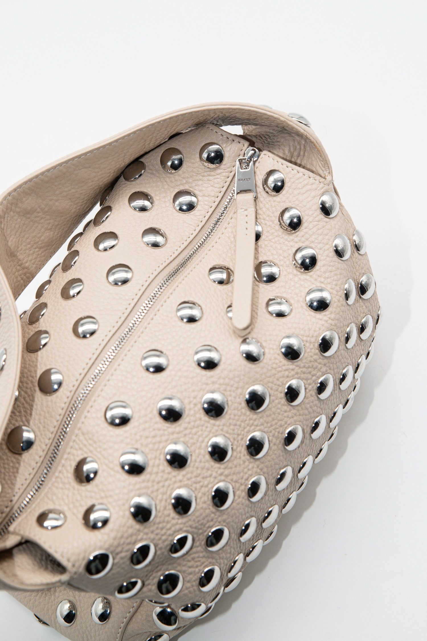 Thumbnail of http://Khaite%20Elena%20Medium%20aus%20Leder%20in%20Ecru%20und%20Silber