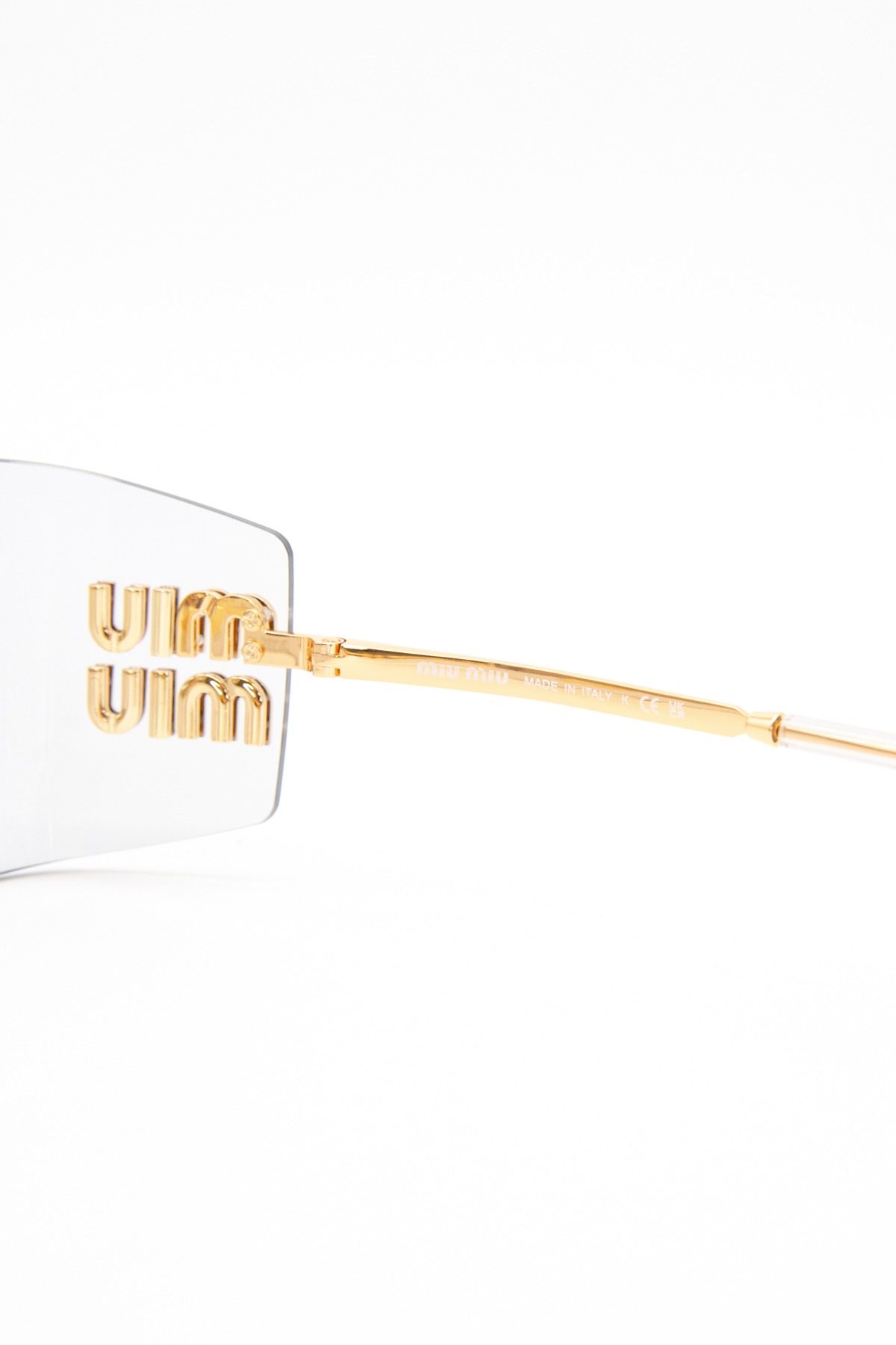 Thumbnail of http://Miu%20Miu%20Aube%20Sonnenbrille%20in%20Gold%20und%20Transparent