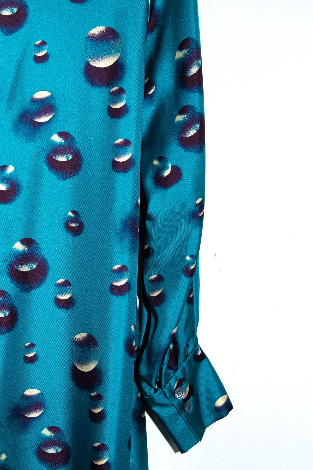 Thumbnail of http://Odeeh%20Midikleid%20mit%20Wassertropfen-Muster%20in%20Petrol%20und%20Lila