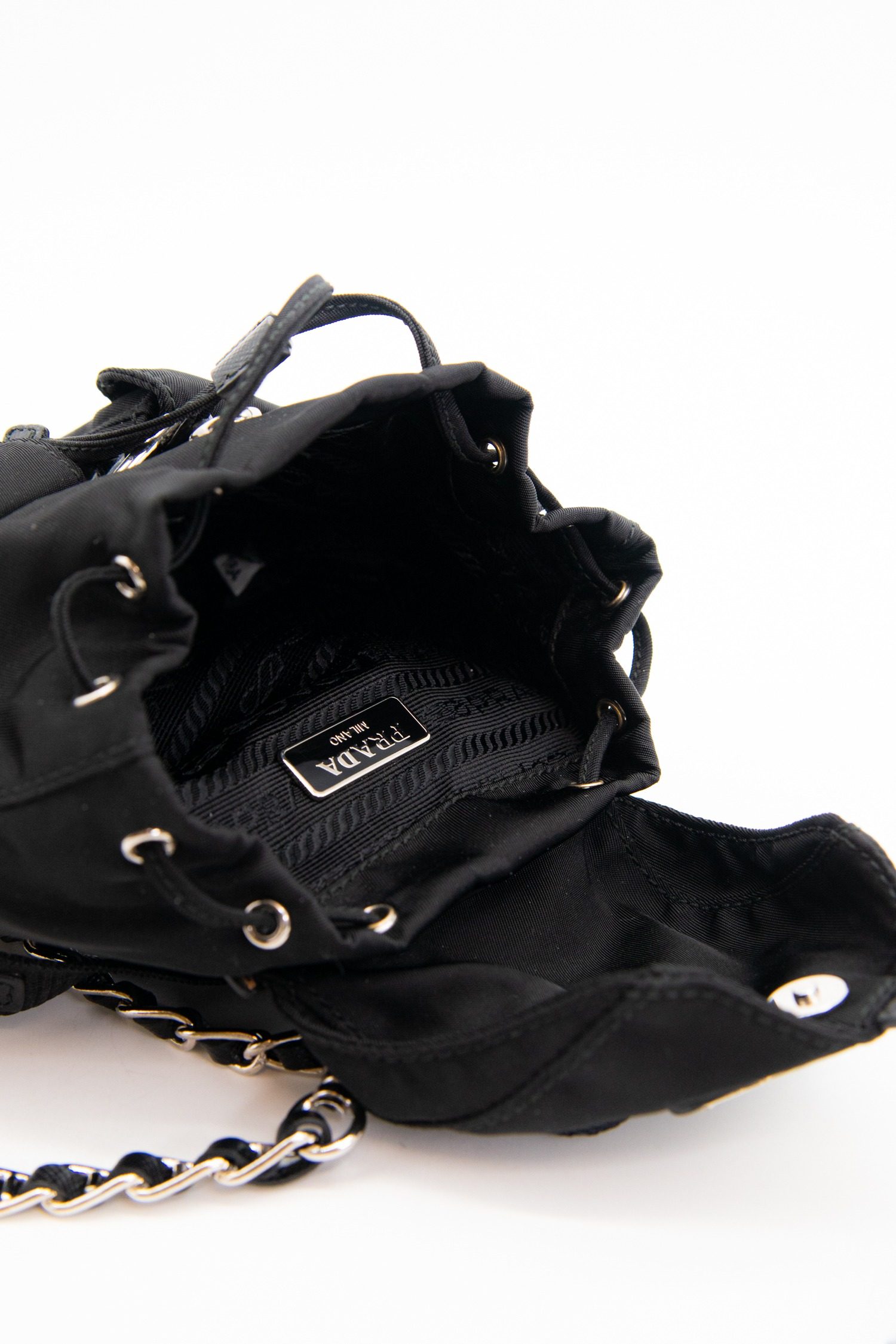 Thumbnail of http://Prada%20Re%20Nylon%20Mini%20Rucksack%20in%20Schwarz%20und%20Silber