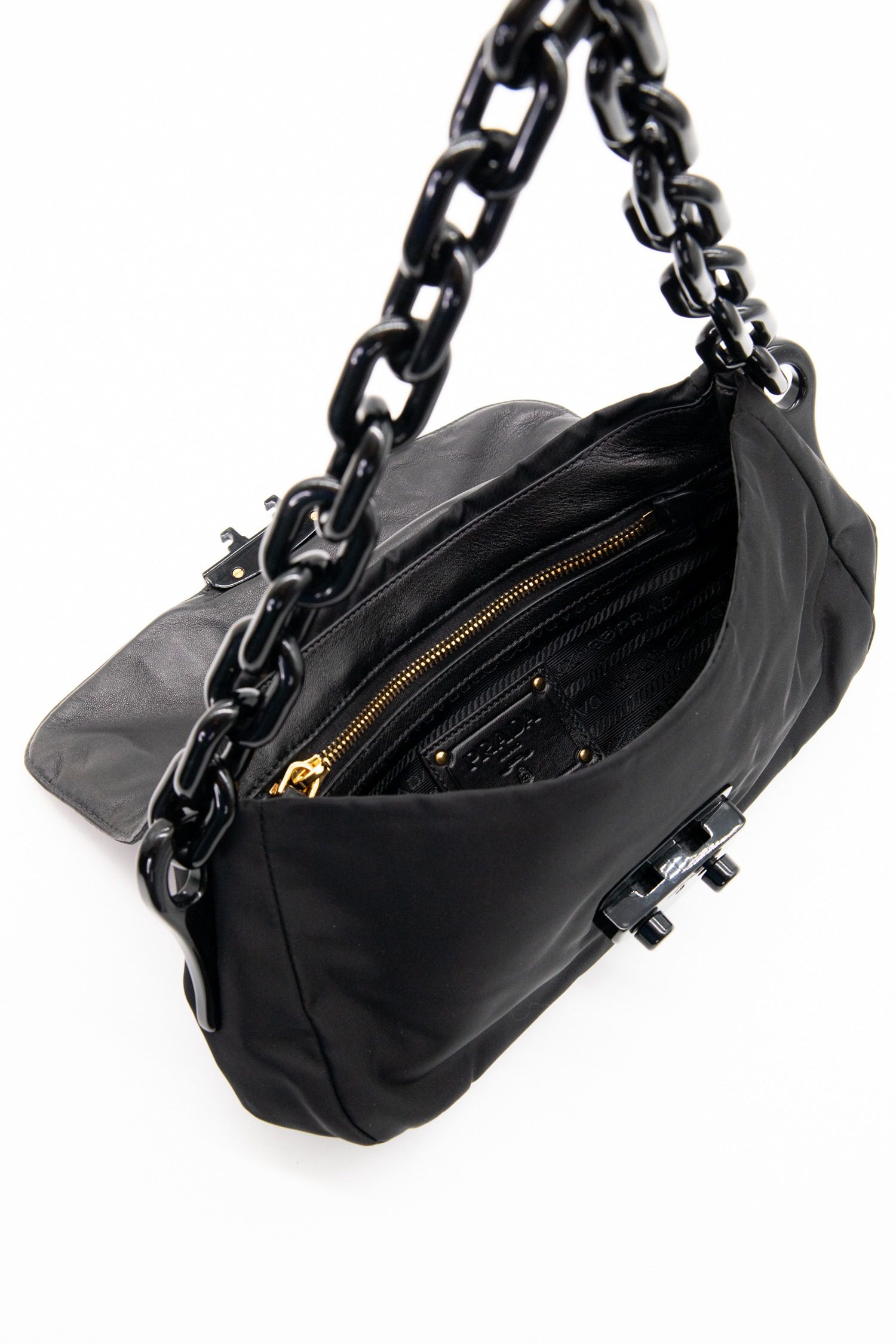 Thumbnail of http://Prada%20Handtasche%20mit%20Schmucksteinen%20in%20Schwarz%20und%20Gold