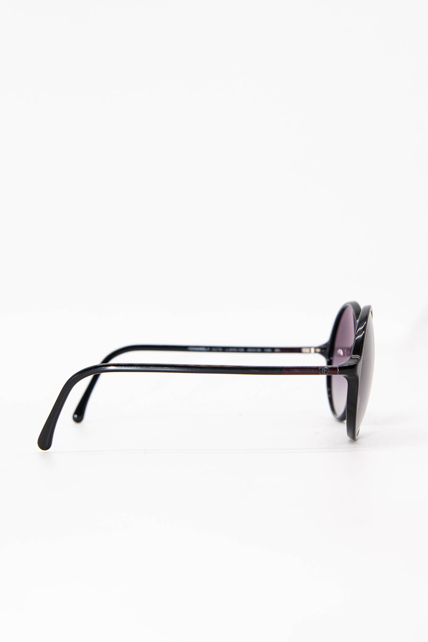 Chanel runde Sonnenbrille in Schwarz