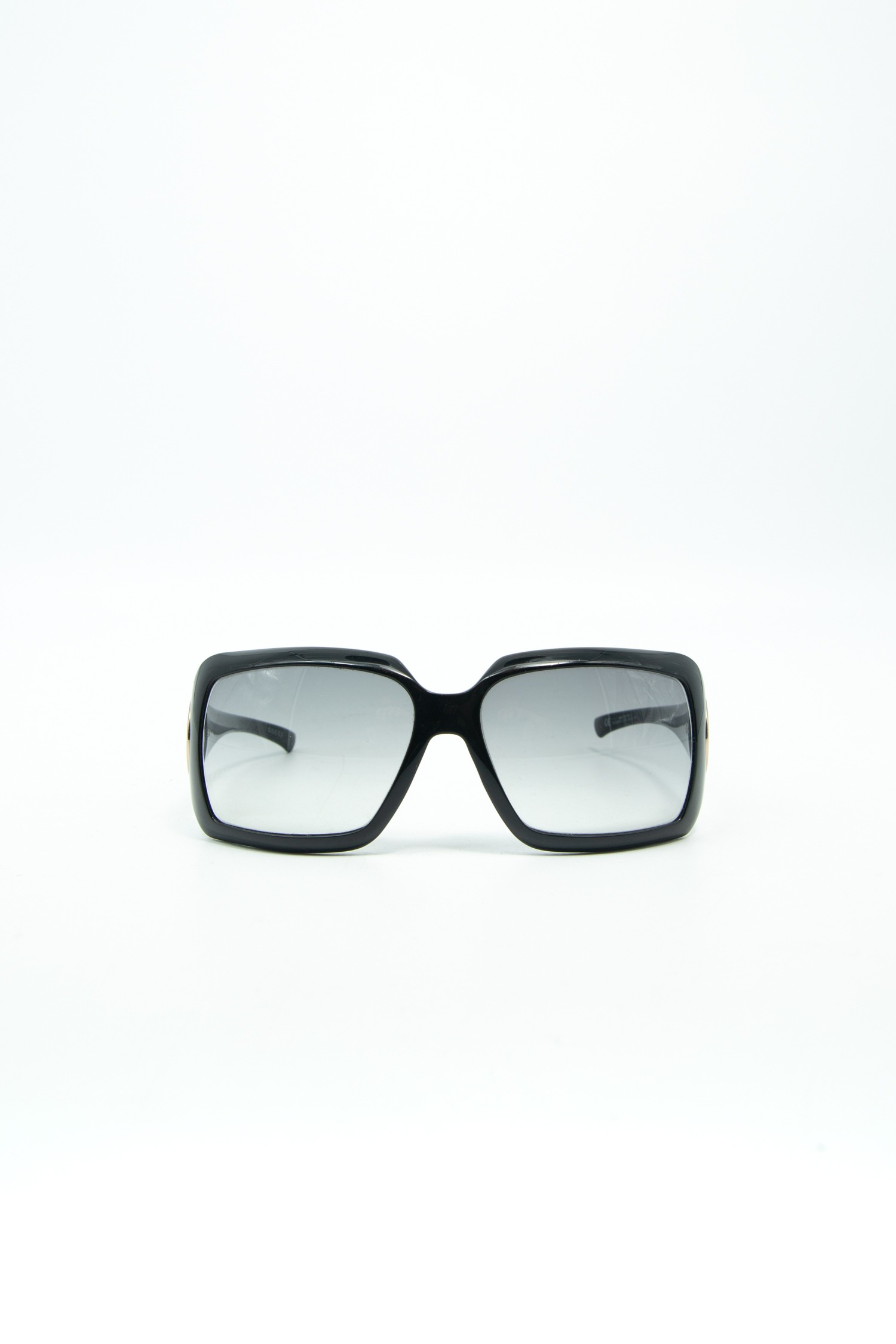 Gucci Sonnenbrille mit Horsebit-Detail in Schwarz und Gold