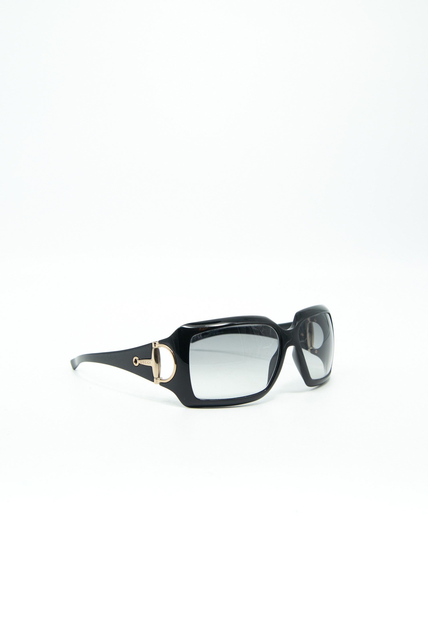 Gucci Sonnenbrille mit Horsebit-Detail in Schwarz und Gold