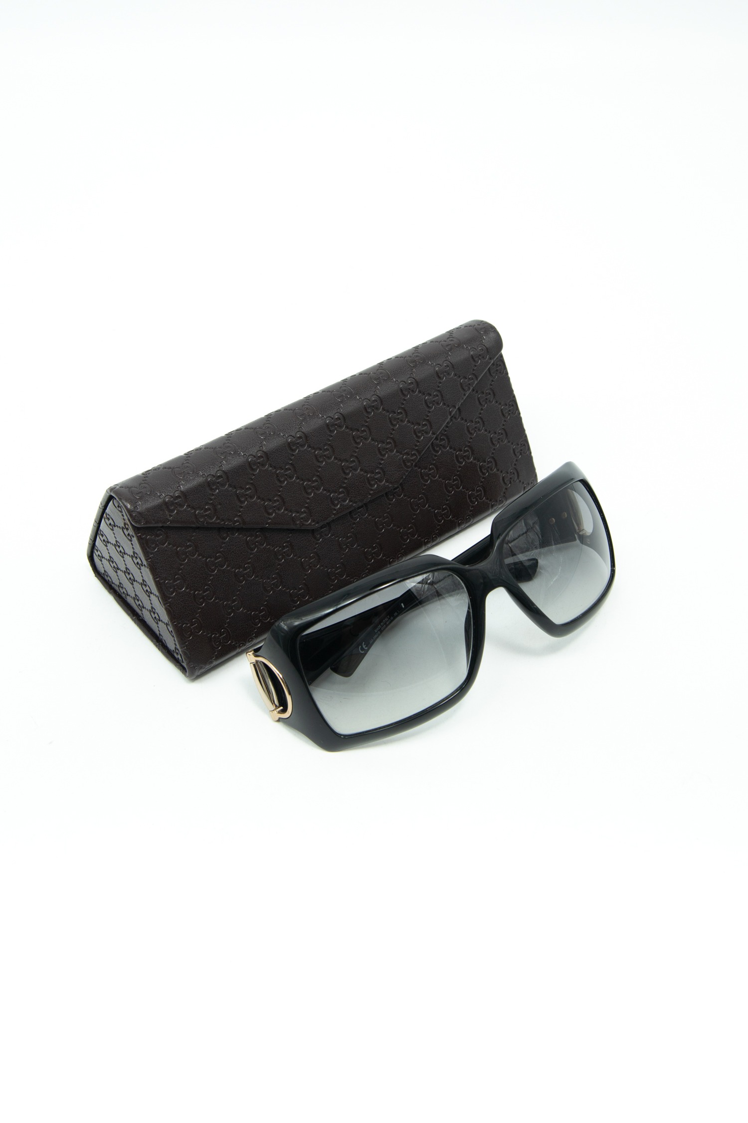 Gucci Sonnenbrille mit Horsebit-Detail in Schwarz und Gold